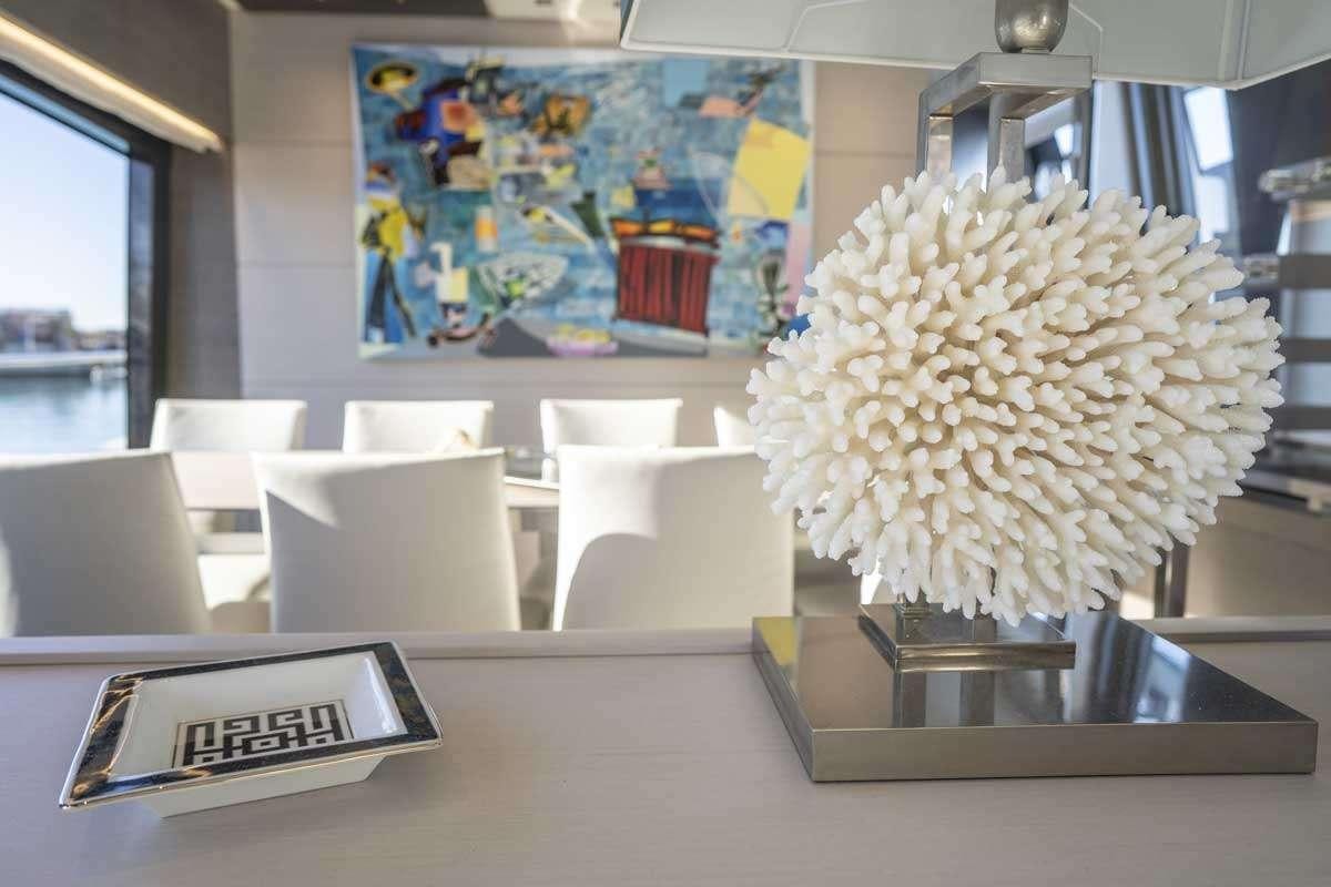 a large bouquet of flowers on a table aboard EM3 Yacht for Charter