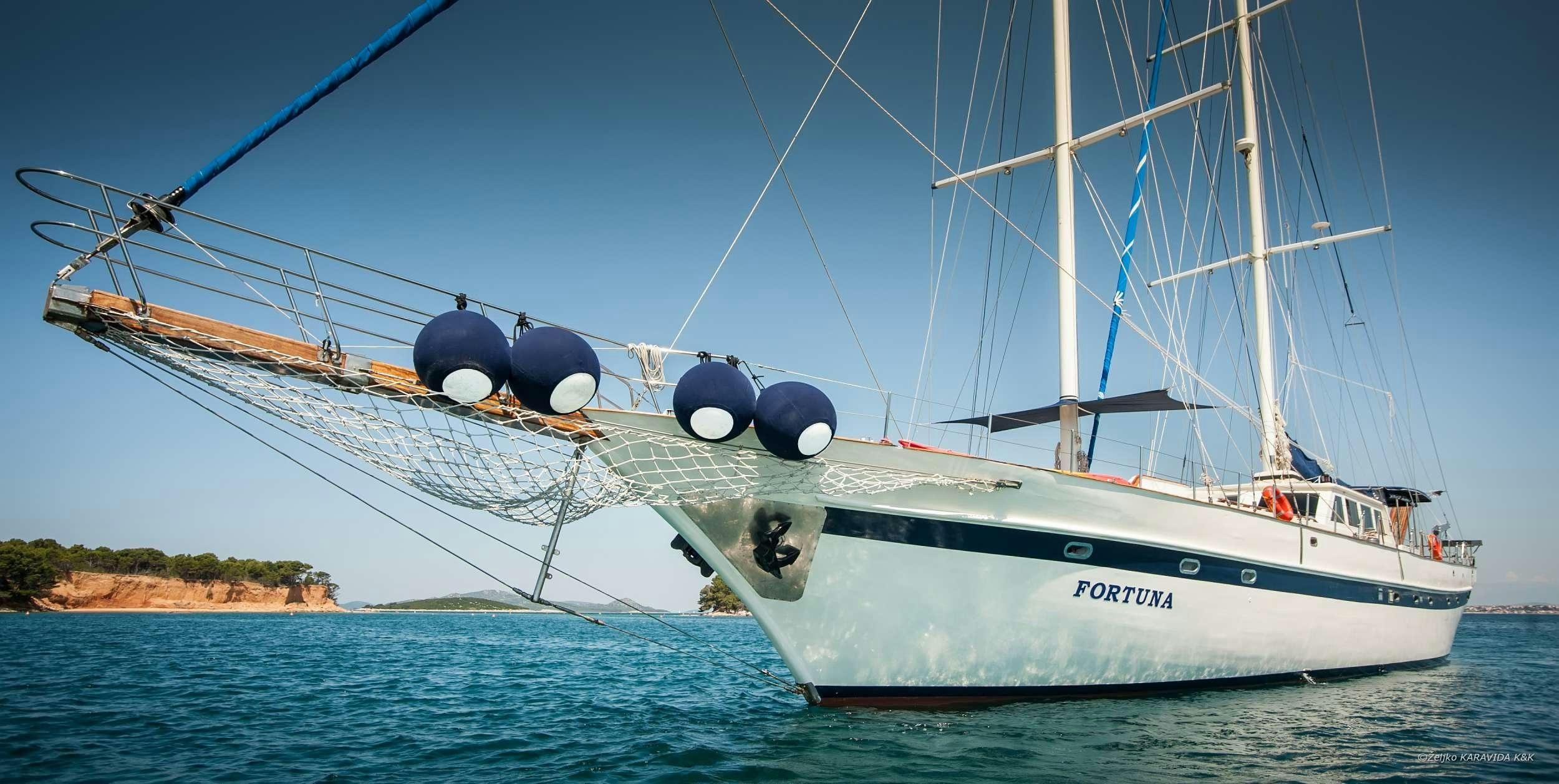 a boat on the water aboard FORTUNA Yacht for Charter