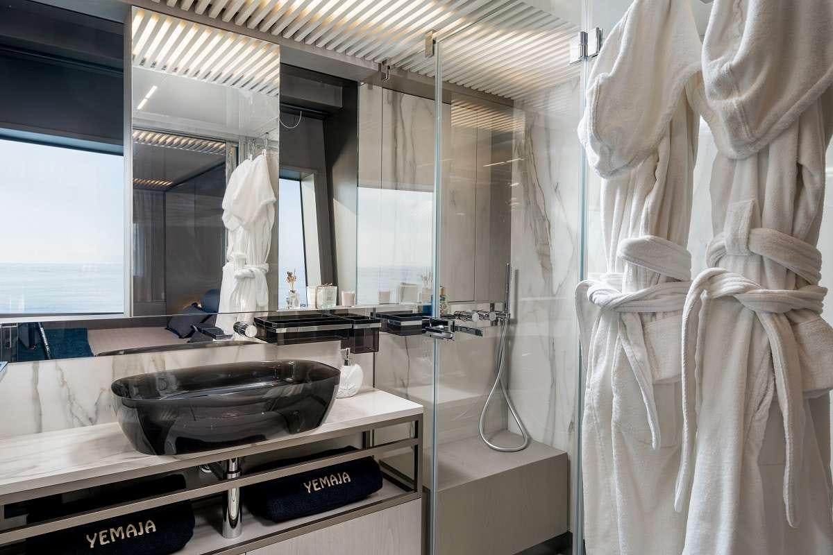 a large bathroom with a large sink aboard YEMAJA Yacht for Charter