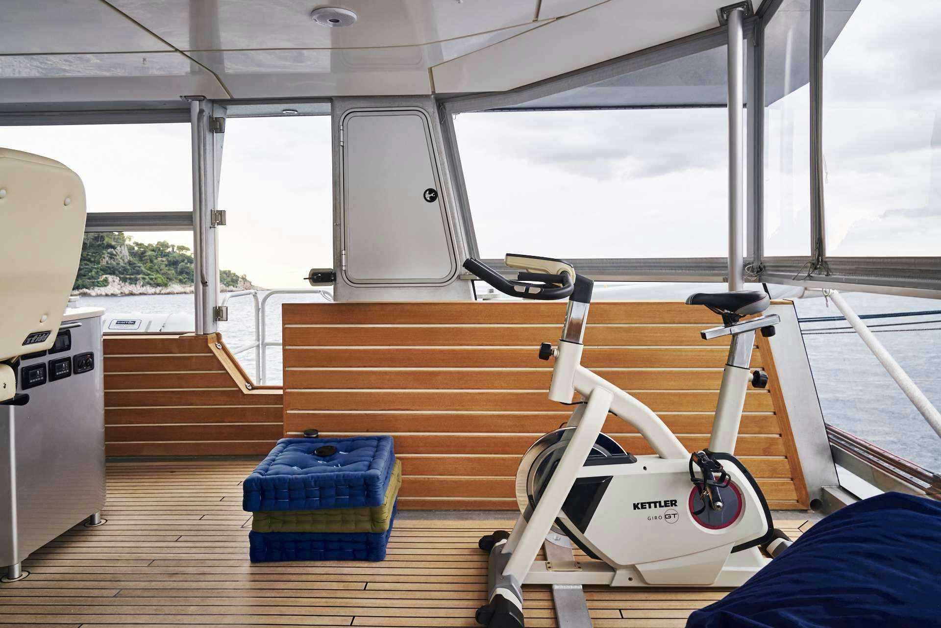 a boat with a surfboard aboard ICEBERG Yacht for Charter