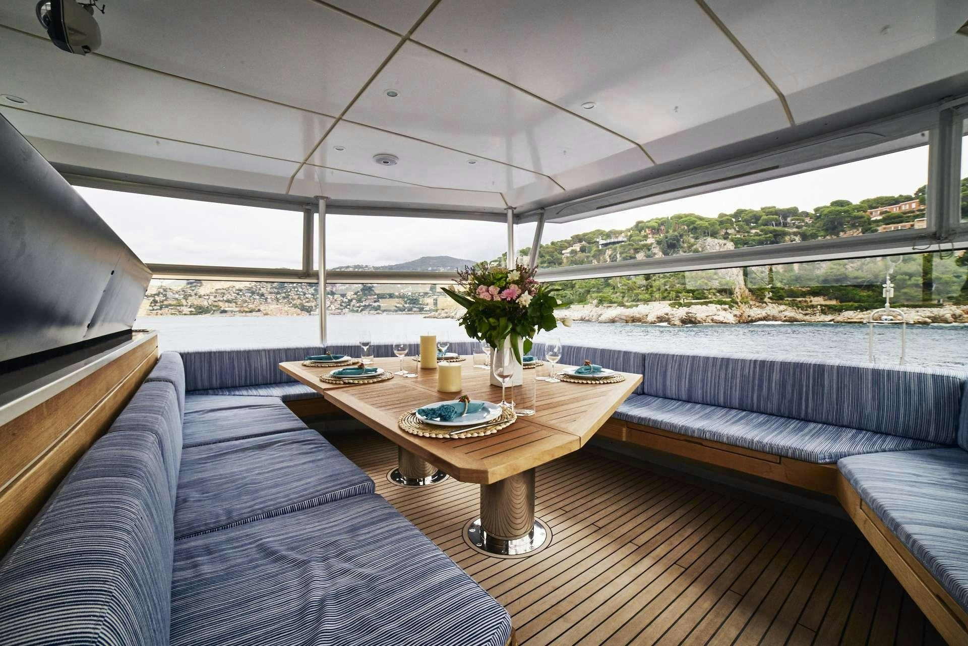 a table on a boat aboard ICEBERG Yacht for Charter