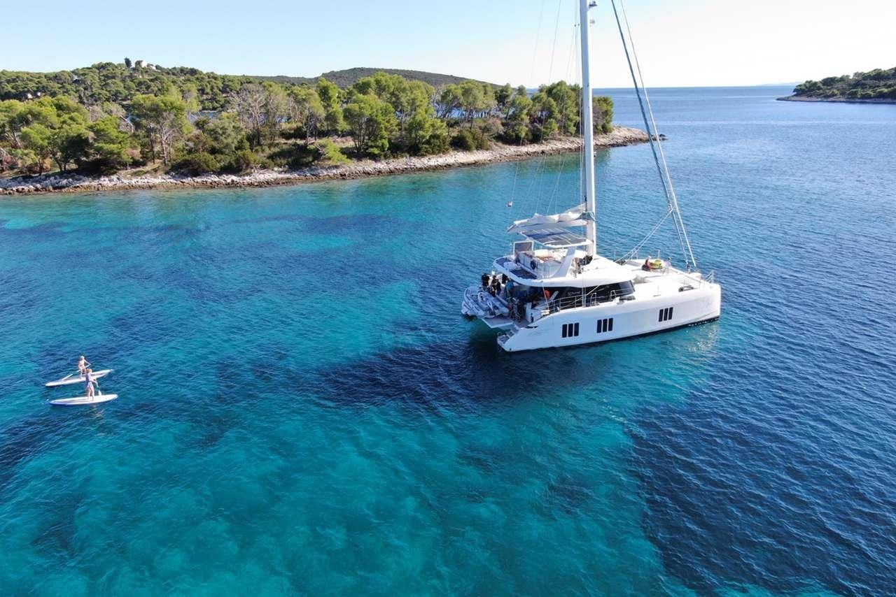 a boat sailing on the water aboard TIRIL Yacht for Charter