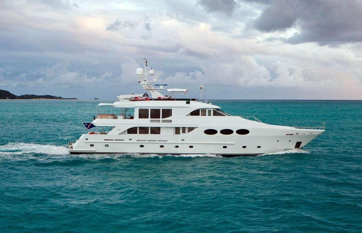 a white boat in the water aboard LAST CALL Yacht for Charter
