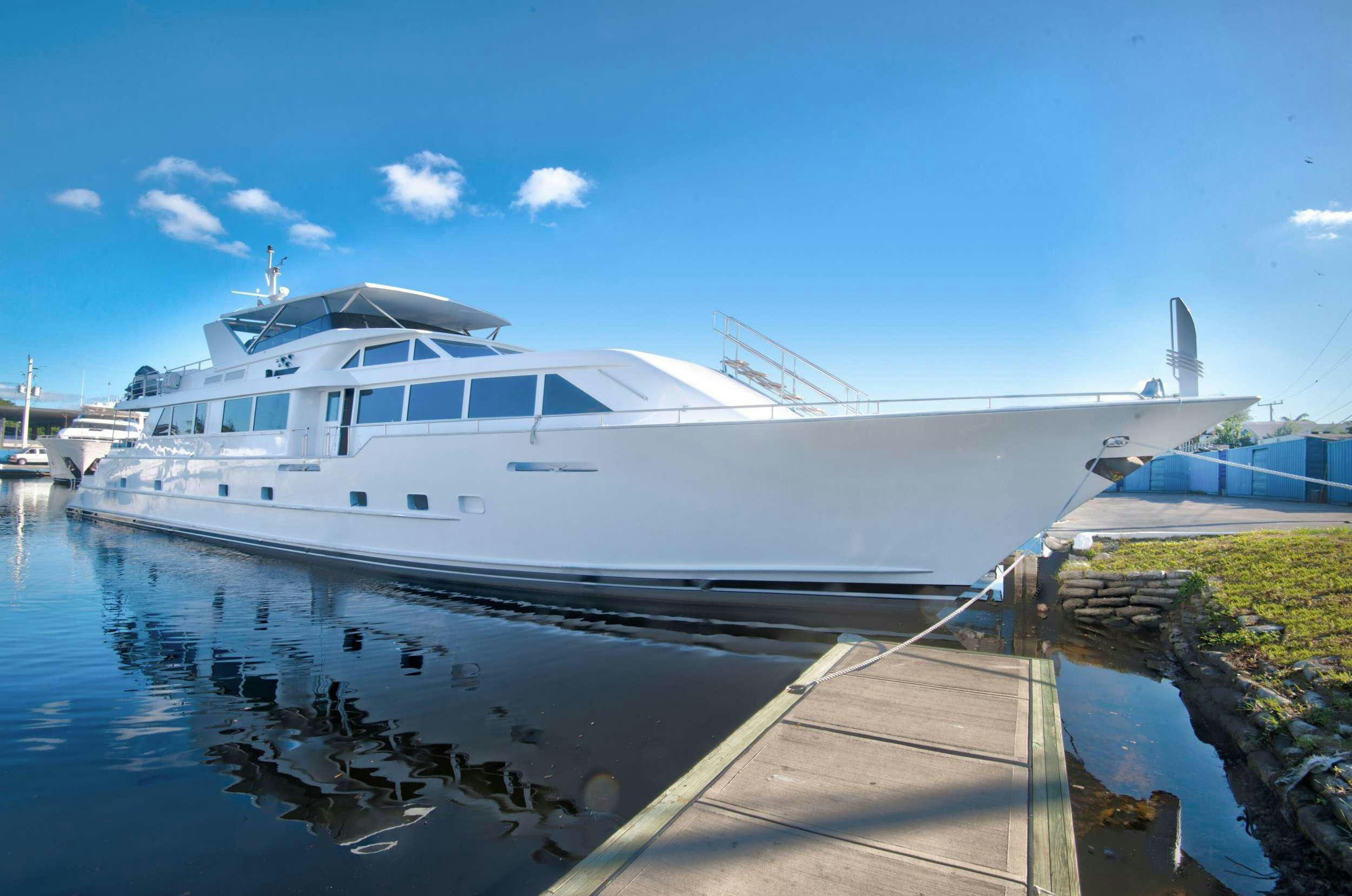 a boat docked at a pier aboard DESLIZE Yacht for Charter