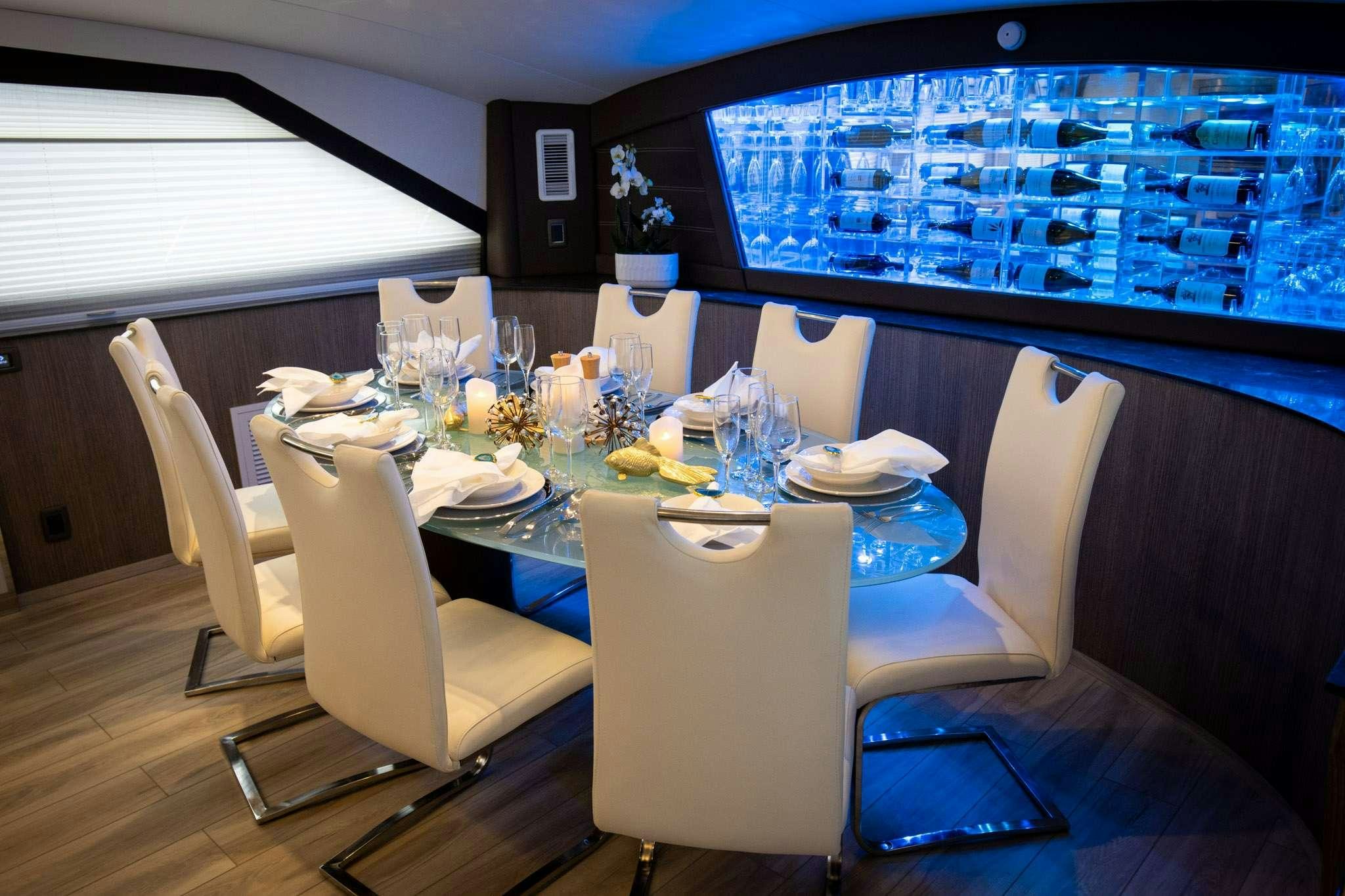 a dining table set for a dinner aboard JULIANNE Yacht for Charter