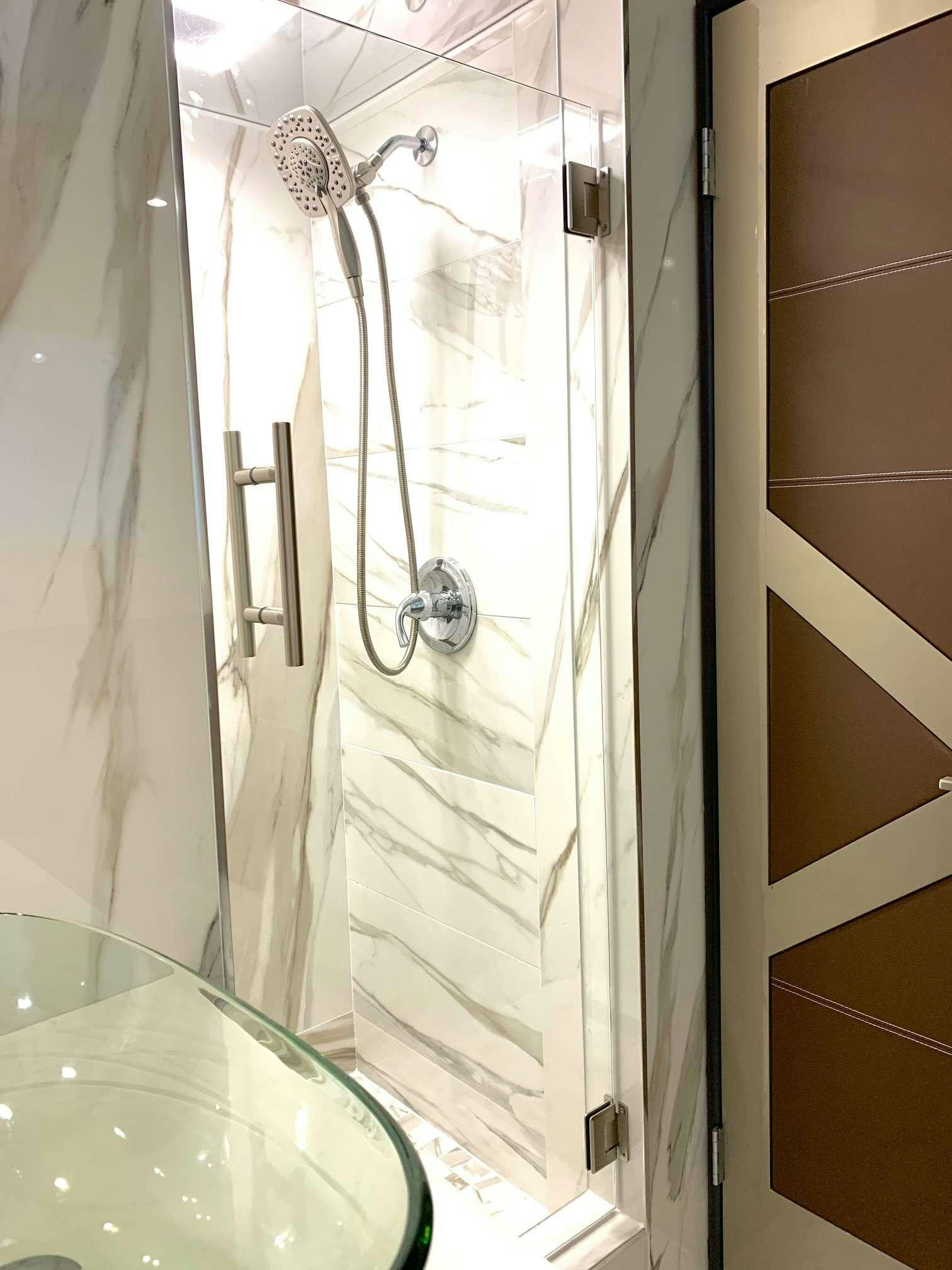 a shower with a glass door aboard JULIANNE Yacht for Charter