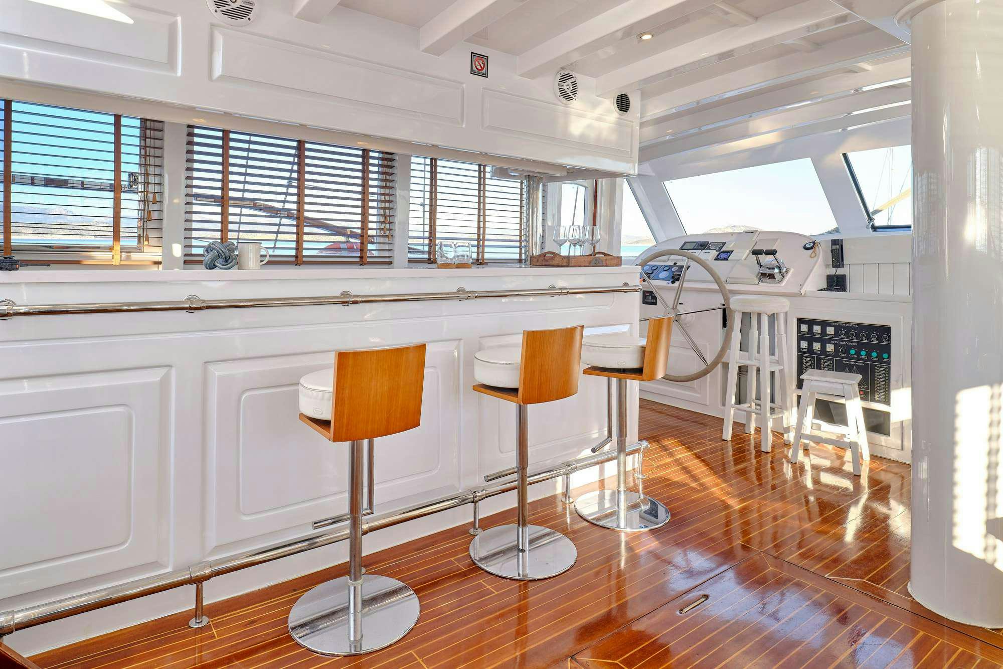 a room with stools and stools aboard WHITE PEARL Yacht for Charter