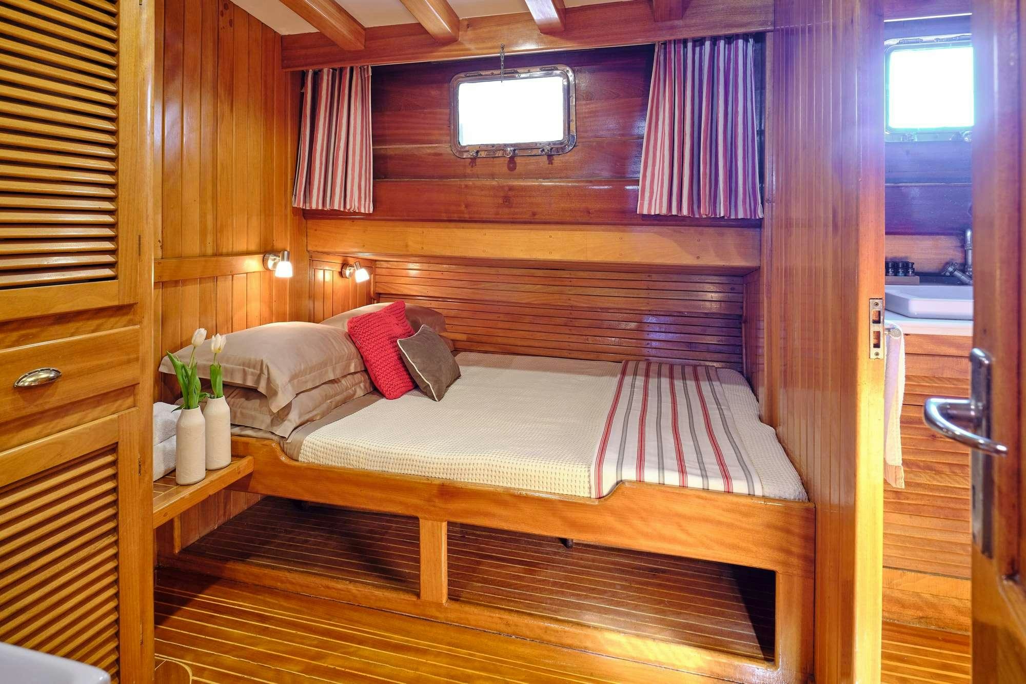 a bed in a room aboard WHITE PEARL Yacht for Charter