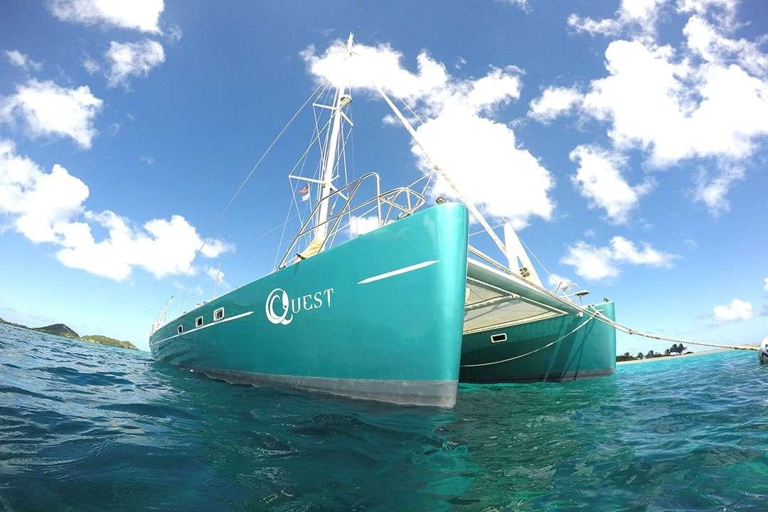 a boat on the water aboard QUEST Yacht for Charter