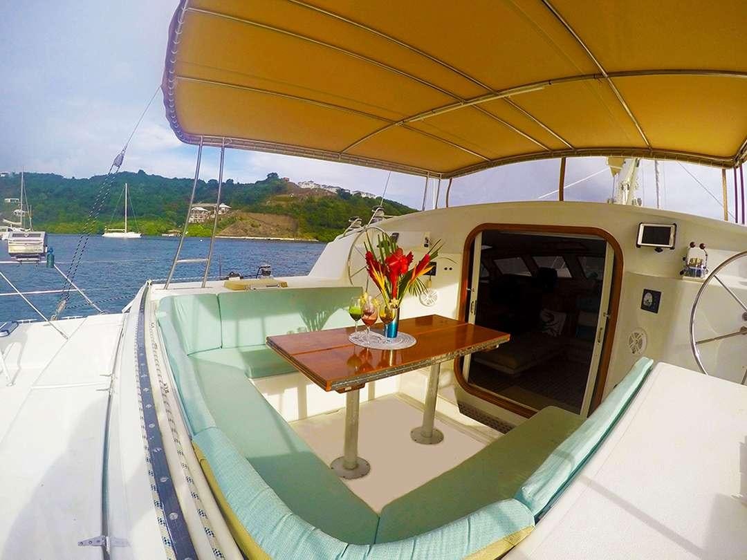 a table on a boat aboard QUEST Yacht for Charter