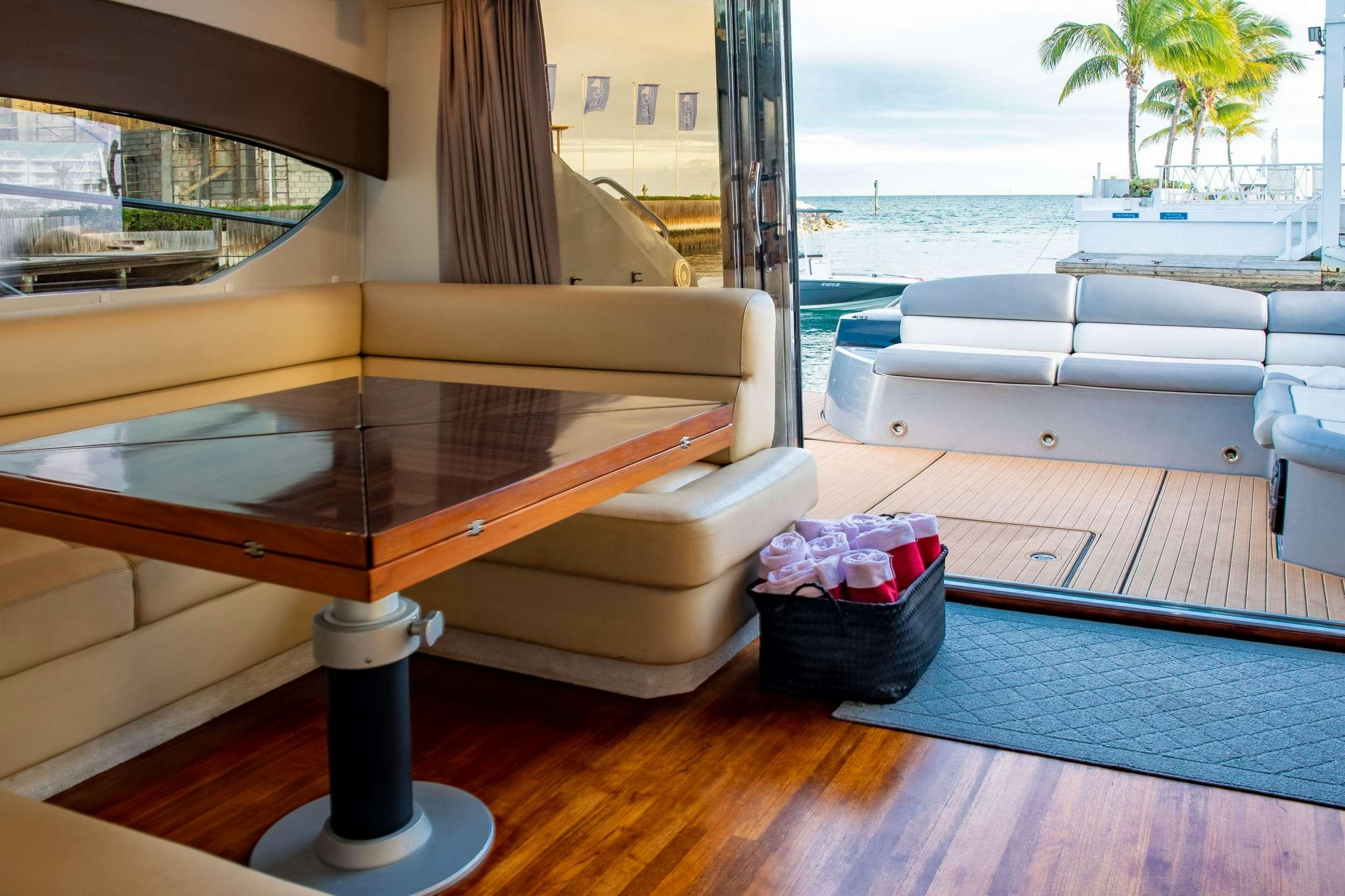 a large piano in a room aboard FLIGHT RISK Yacht for Charter