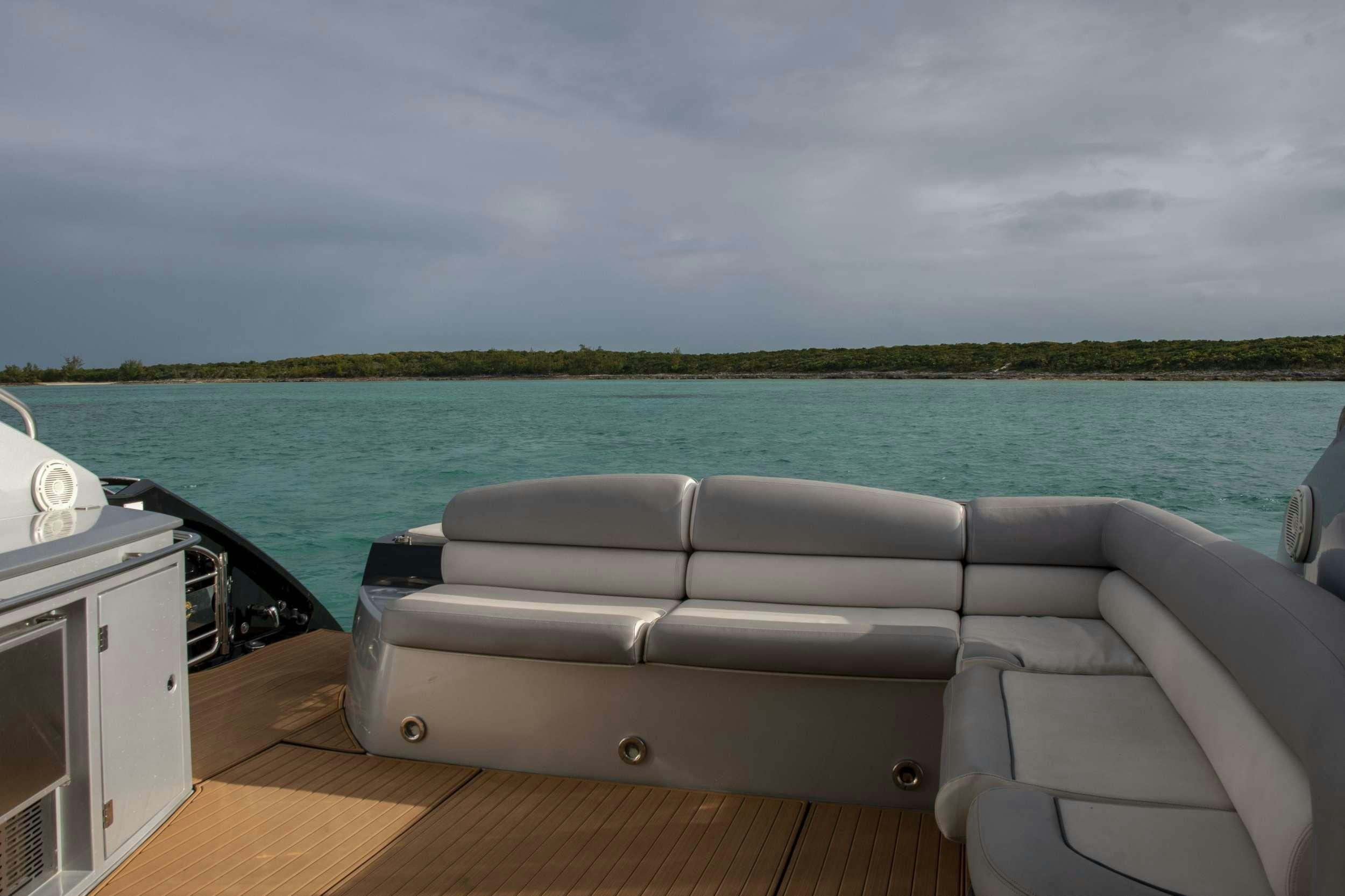 a boat on a body of water aboard FLIGHT RISK Yacht for Charter
