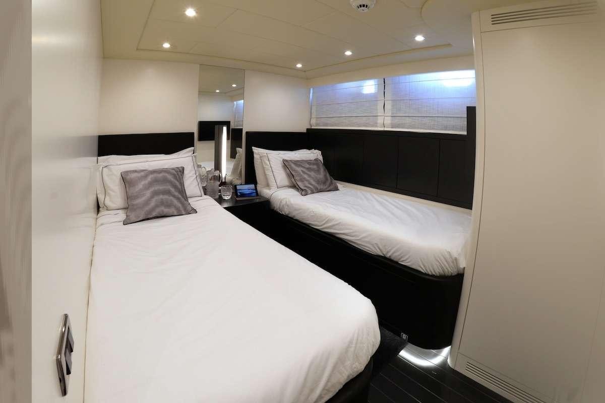 a room with two beds aboard ONLY ONE Yacht for Charter