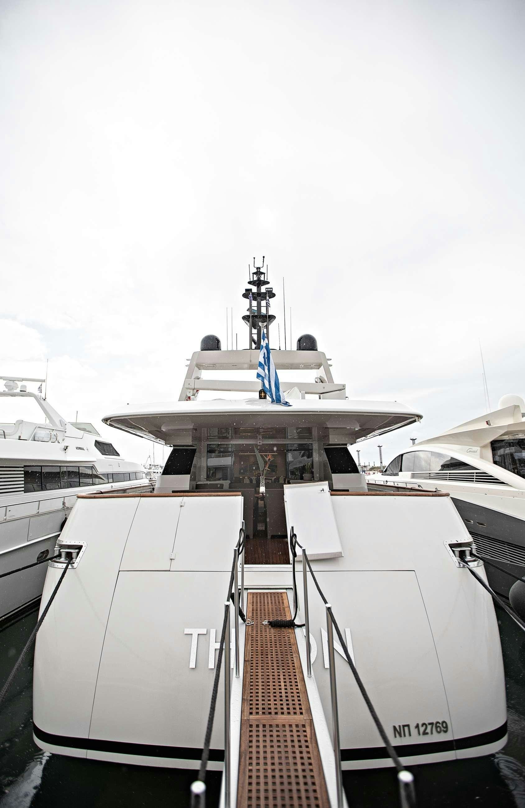 a boat with a rope attached to it aboard THEION Yacht for Charter