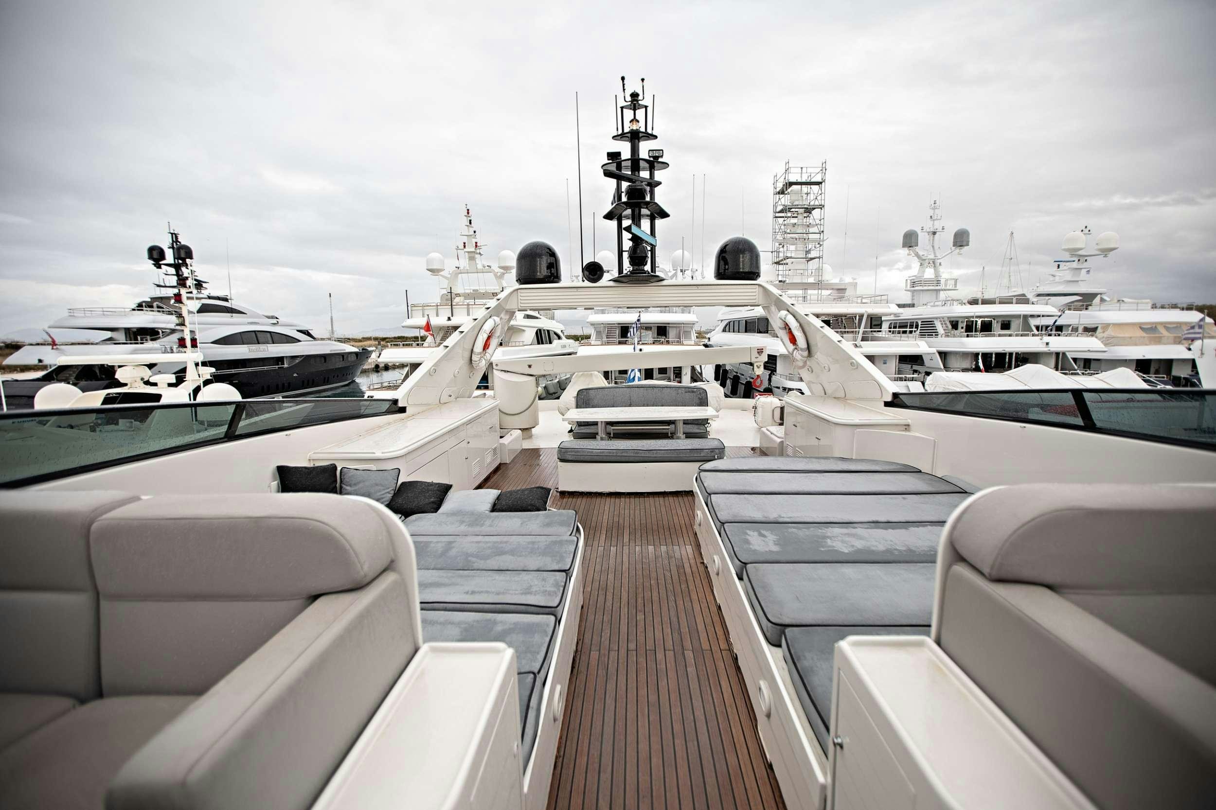 a deck with many boats aboard THEION Yacht for Charter