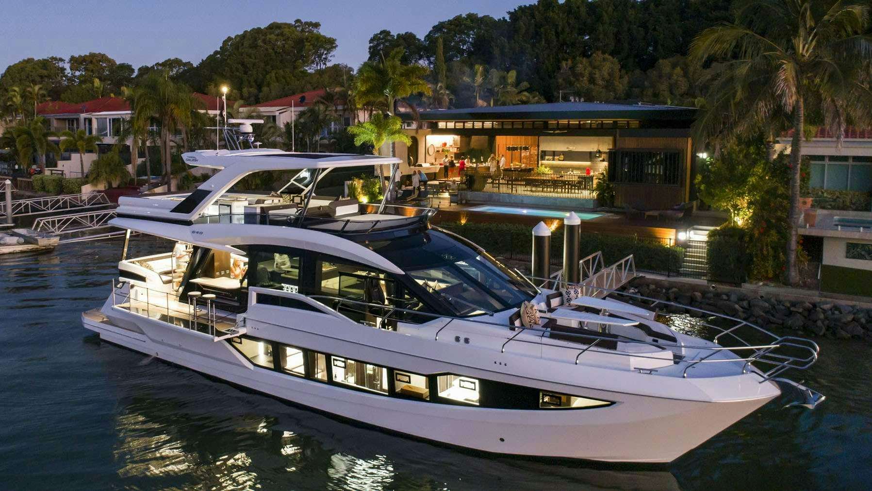 a couple of boats are parked in a harbor aboard TRIPLE T Yacht for Charter