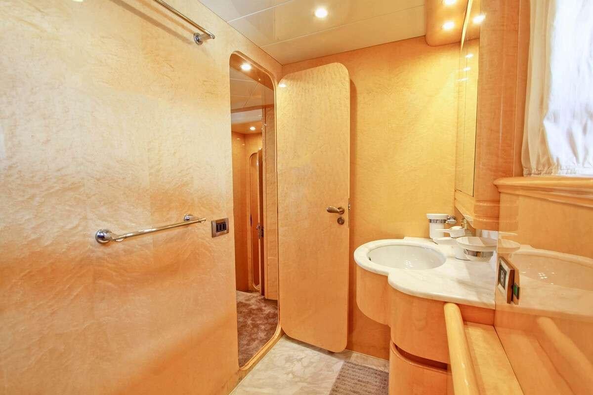 a bathroom with a sink and a shower aboard PRIME Yacht for Charter