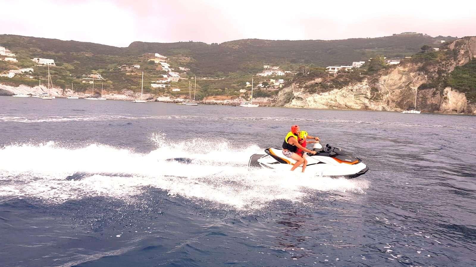 a person on a jet ski aboard PRIME Yacht for Charter