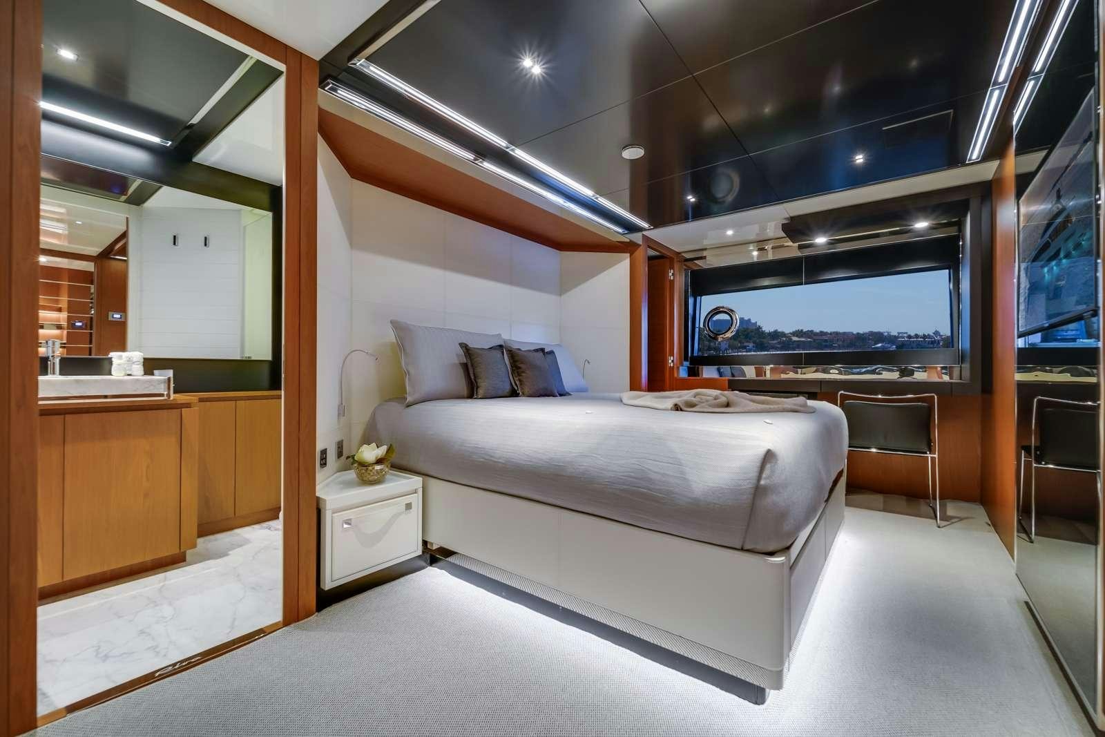 a bed in a room aboard BEYOND BEYOND Yacht for Charter
