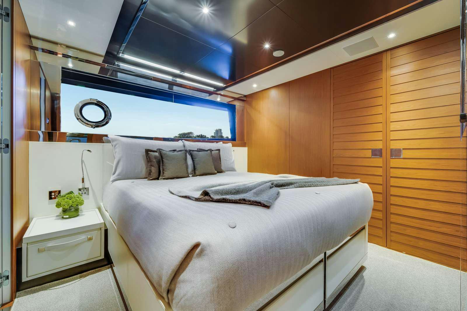 a bed in a room aboard BEYOND BEYOND Yacht for Charter