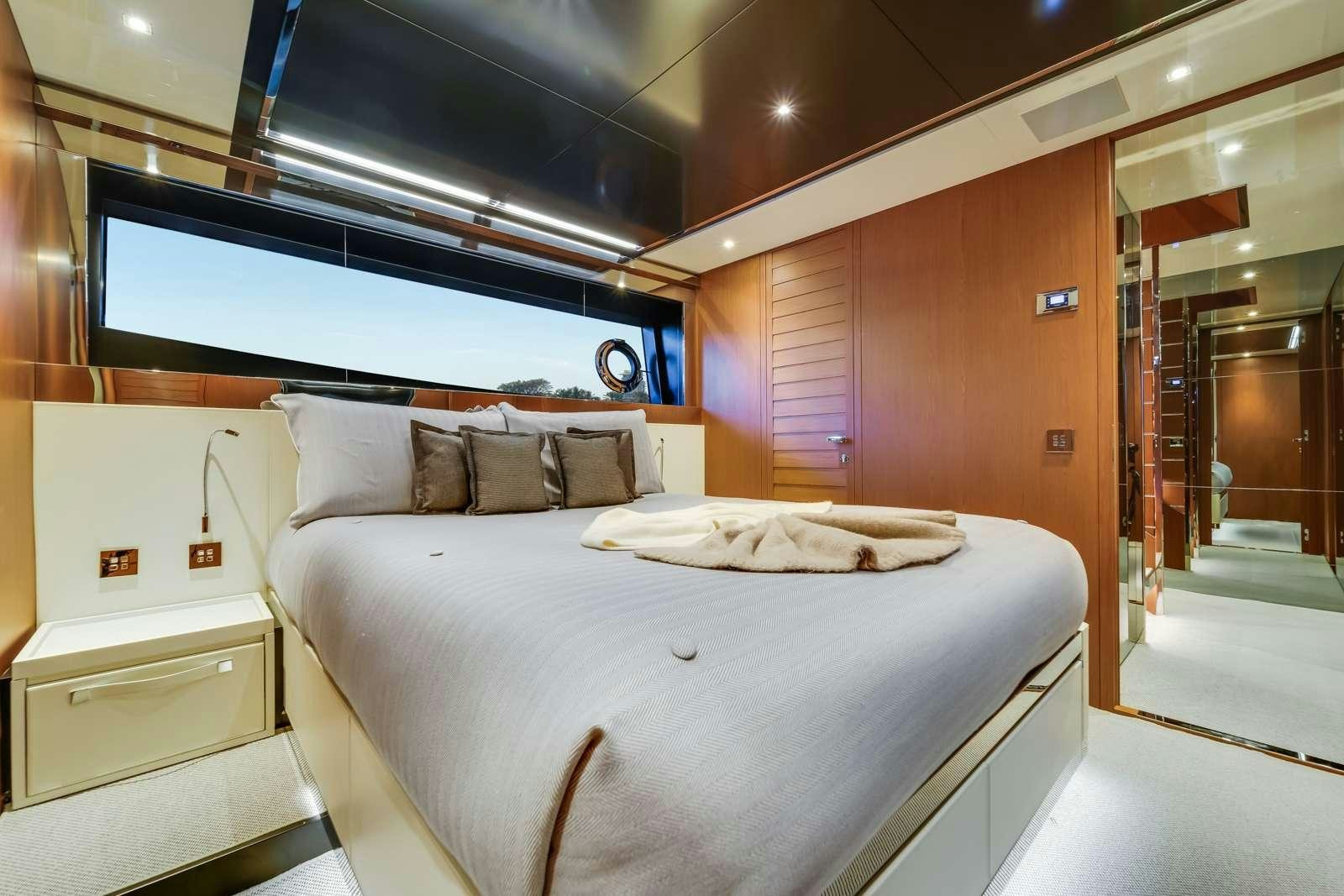 a bed in a room aboard BEYOND BEYOND Yacht for Charter