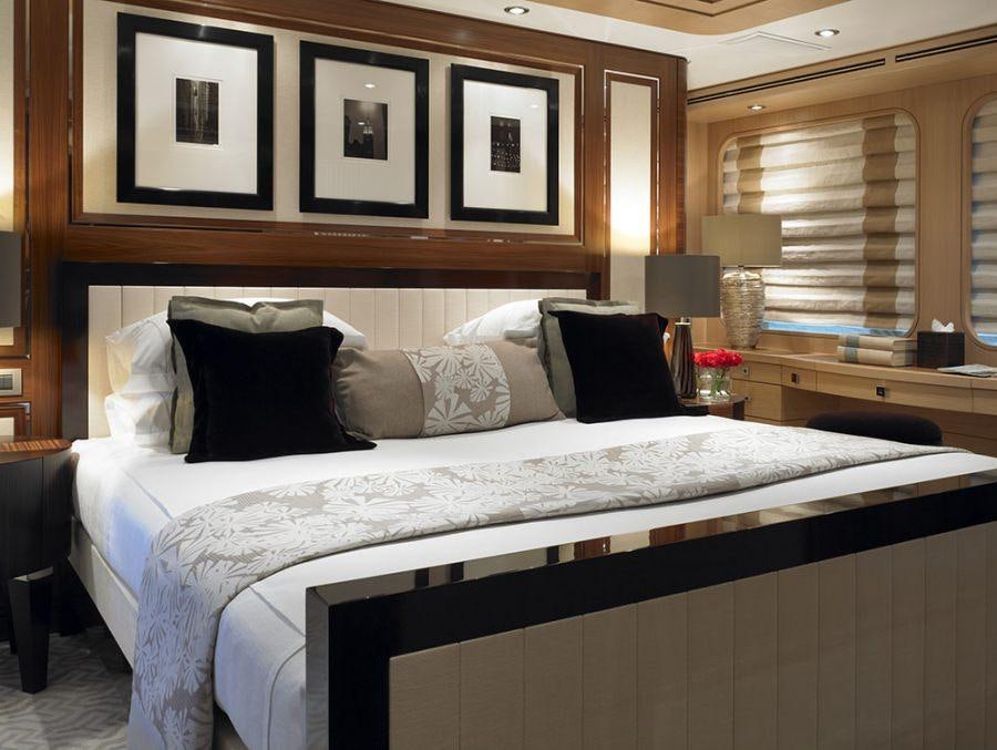 a bed with pillows aboard KATHLEEN ANNE Yacht for Charter