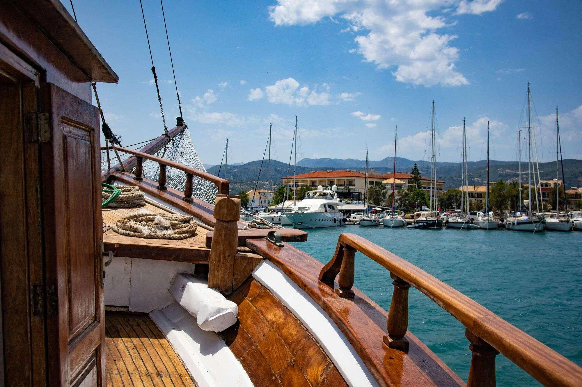 a dock with boats aboard AEGEOTISSA II Yacht for Charter