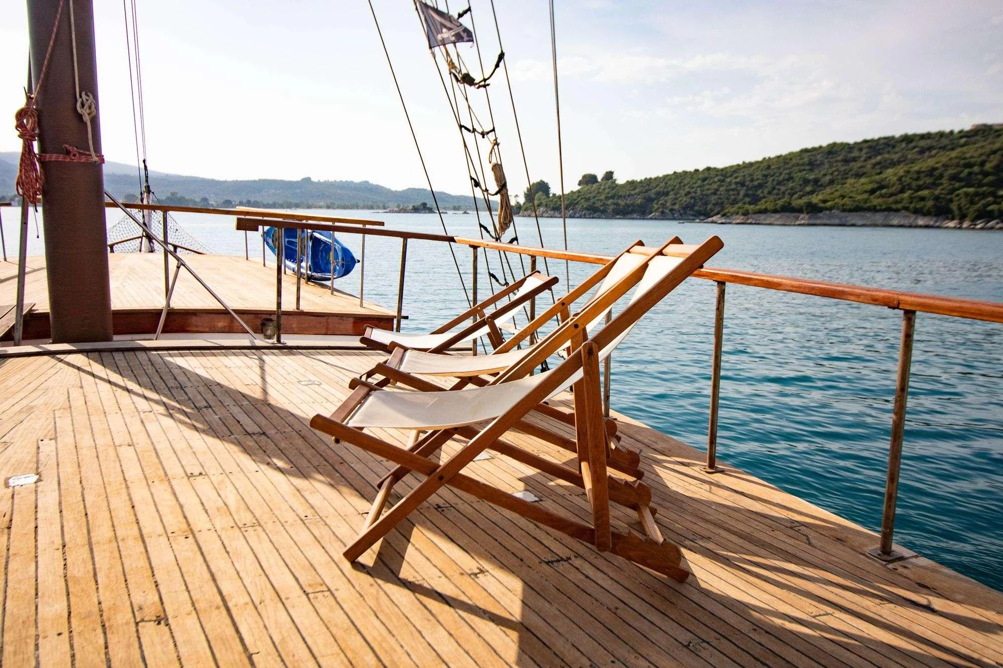 a wooden boat on a dock aboard AEGEOTISSA II Yacht for Charter