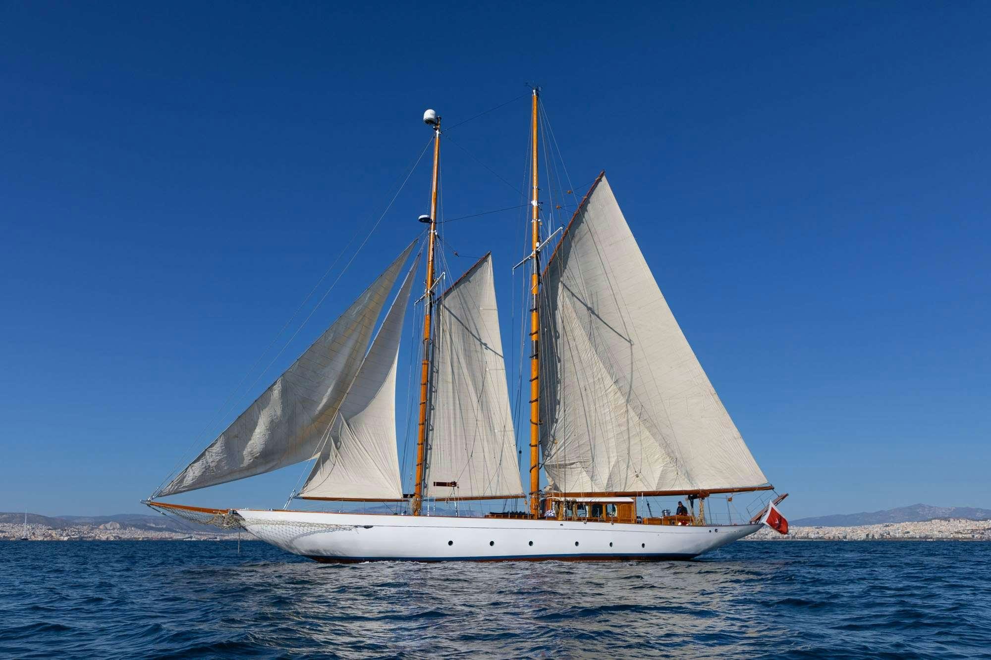 a sailboat in the water aboard WEATHER BIRD Yacht for Charter