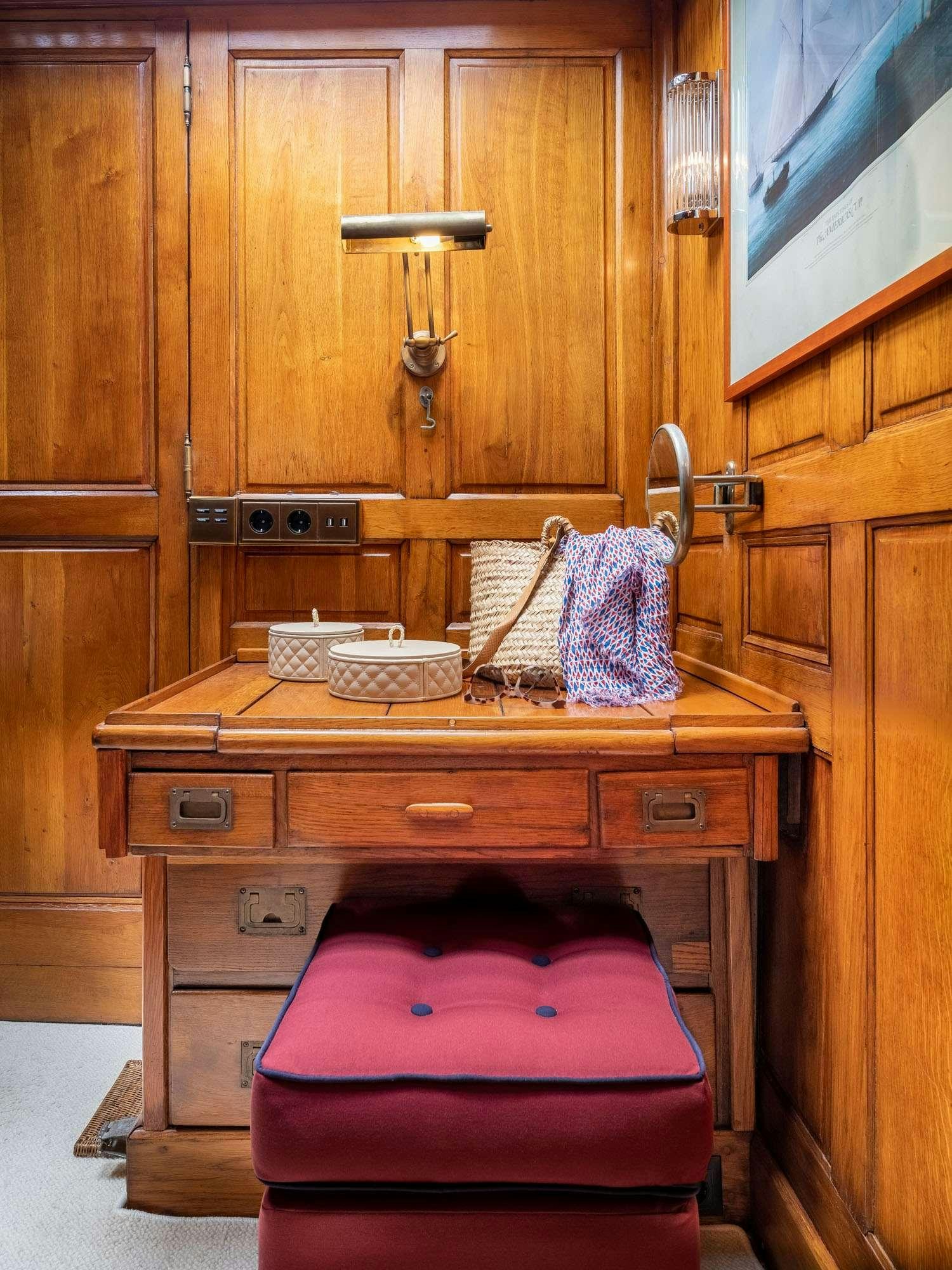 a dresser with a towel on it aboard WEATHER BIRD Yacht for Charter