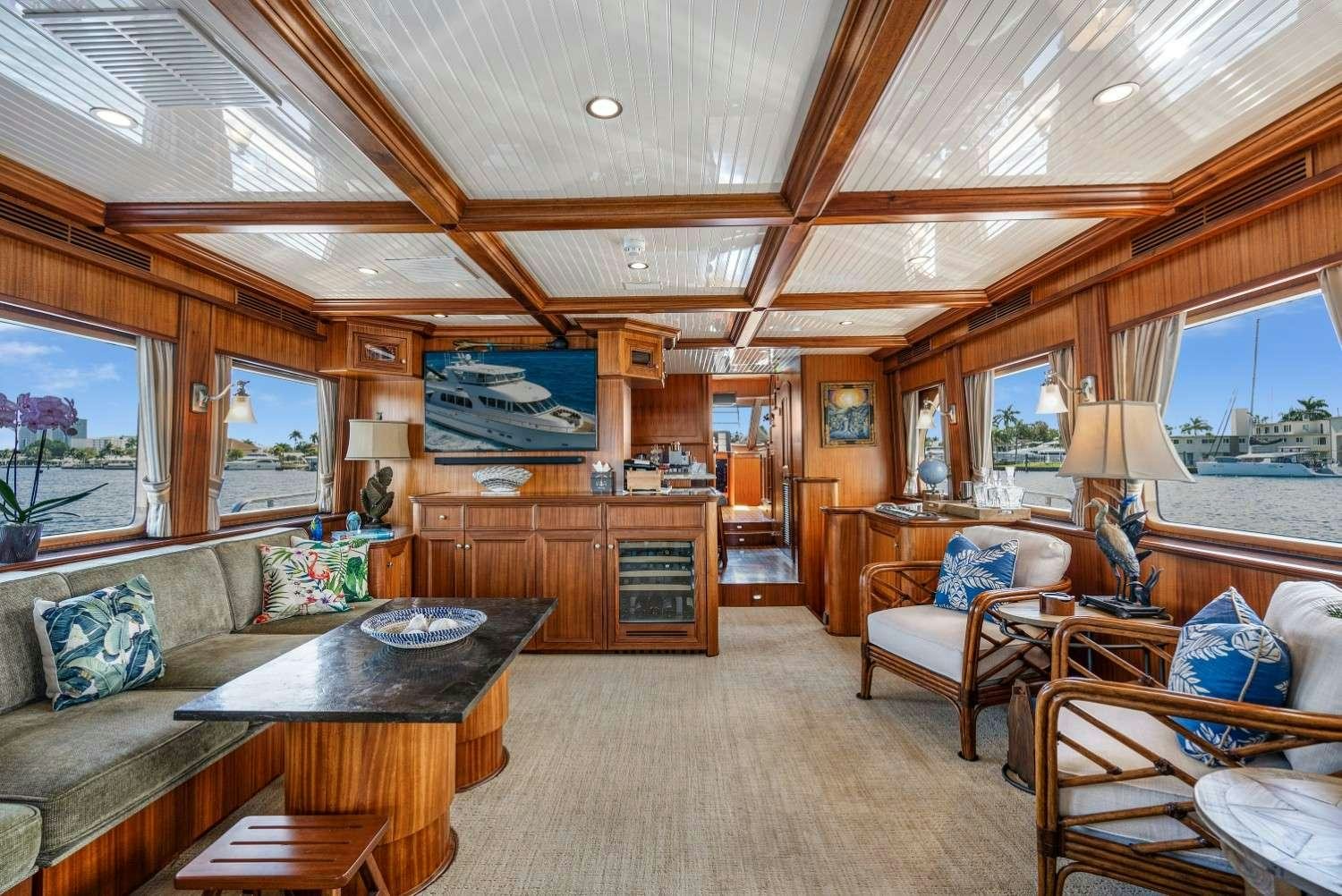 a living room with a wood ceiling aboard SEAS TO SEE Yacht for Charter