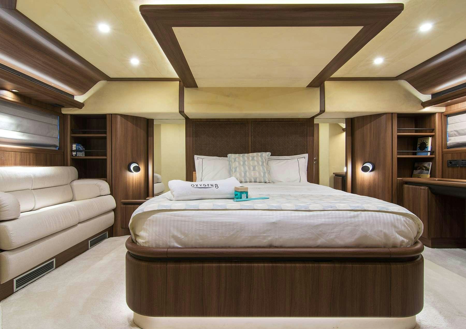 a bed in a room aboard OXYGEN 8 Yacht for Charter