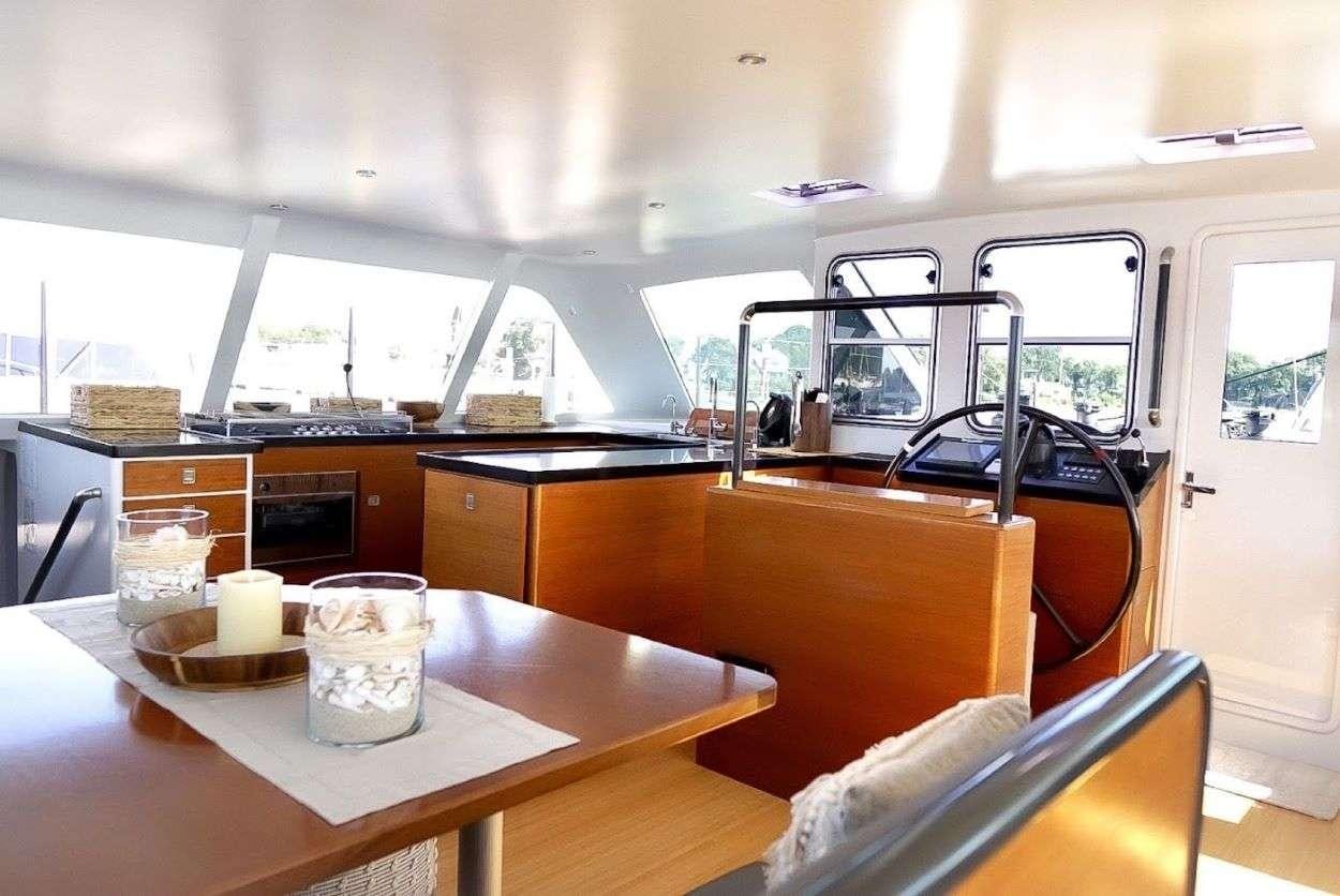 a table with drinks on it aboard GAIA Yacht for Charter