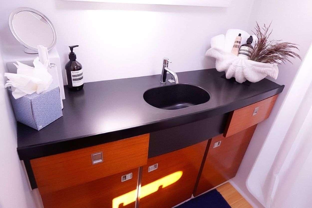 a sink with a towel on it aboard GAIA Yacht for Charter