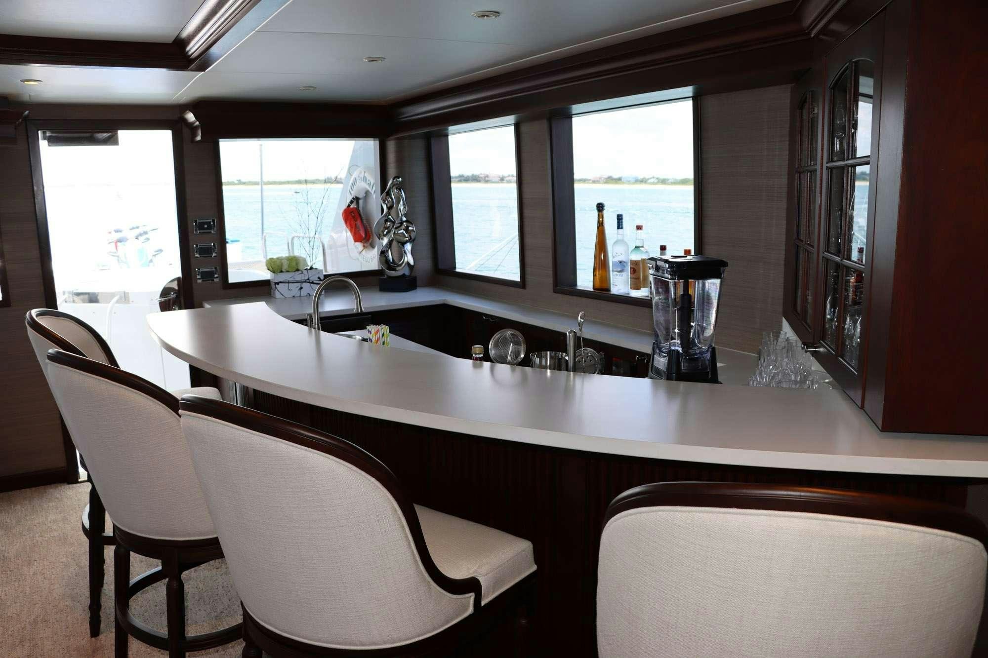a kitchen with a large island aboard TOO SHALLOW Yacht for Charter