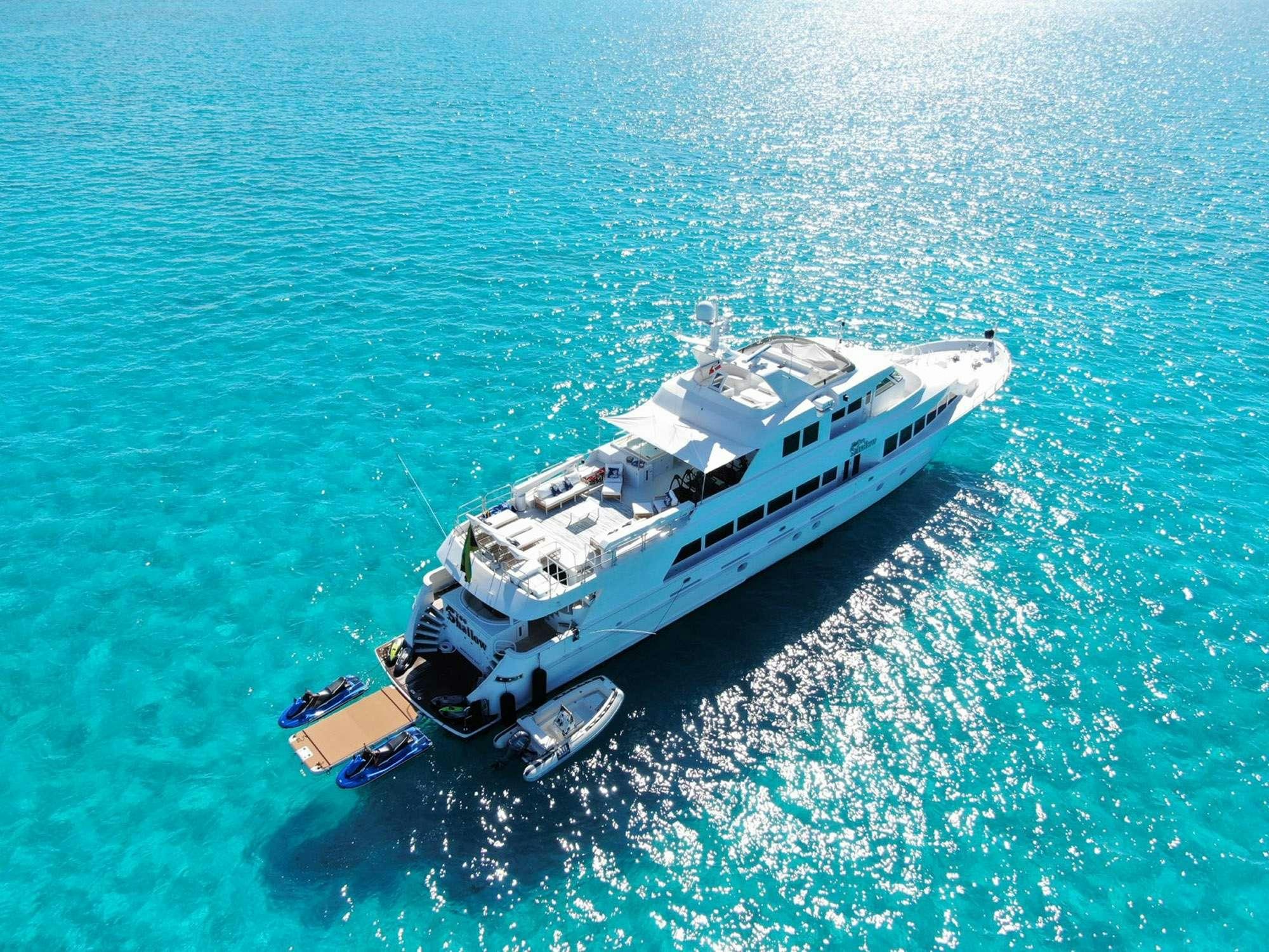 a military vehicle in the water aboard TOO SHALLOW Yacht for Charter