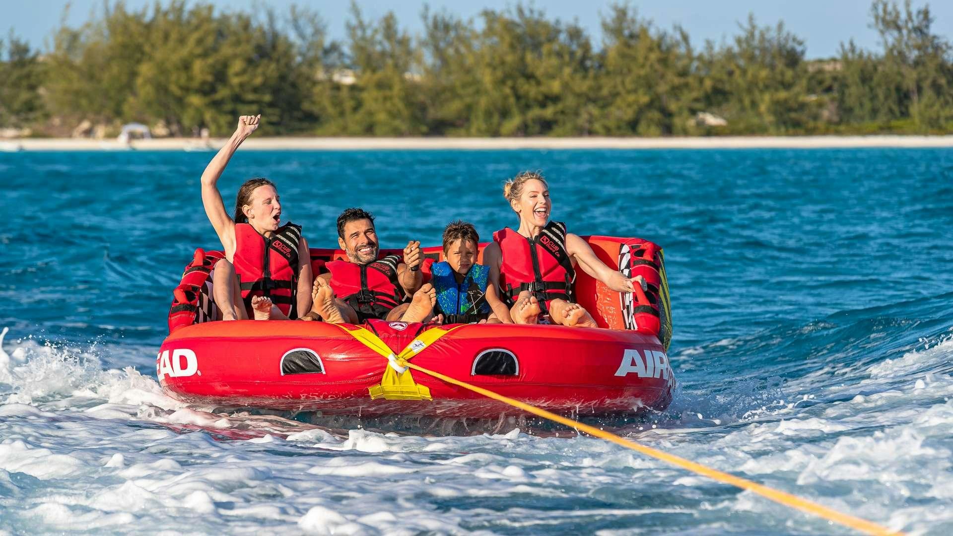 a group of people on a raft aboard STARSHIP Yacht for Charter