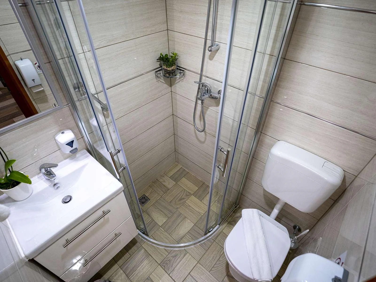 a bathroom with a glass shower aboard KARIZMA Yacht for Charter