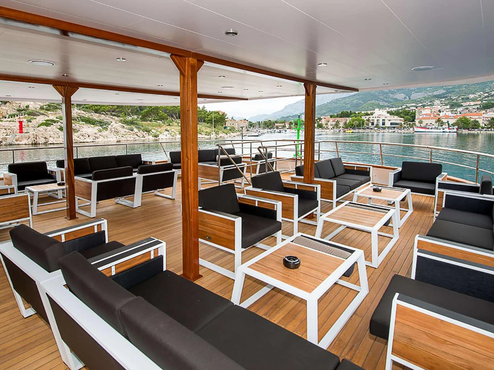 a room with a table and chairs aboard KARIZMA Yacht for Charter