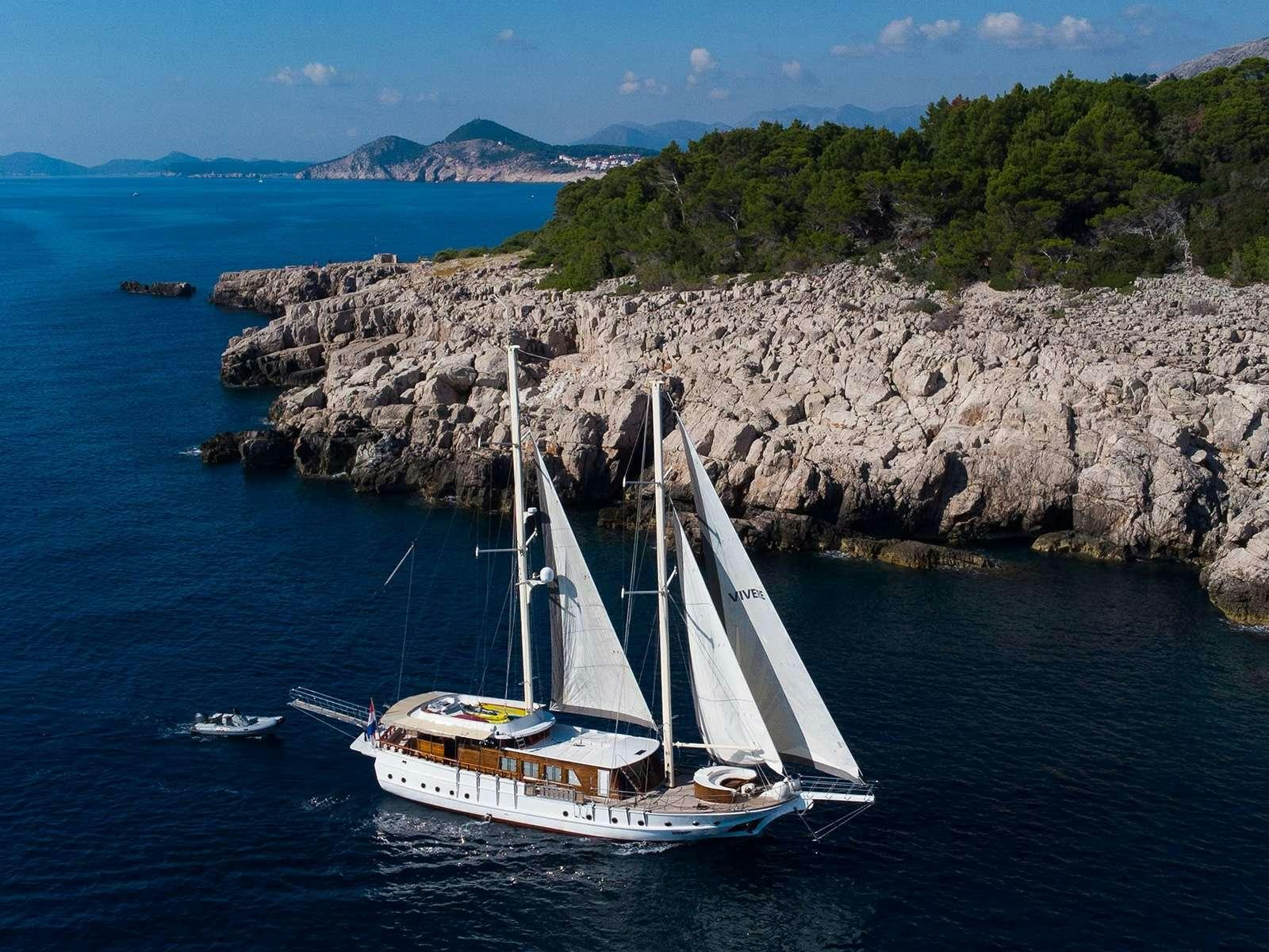 a boat sailing on the water aboard DALMATINO Yacht for Charter