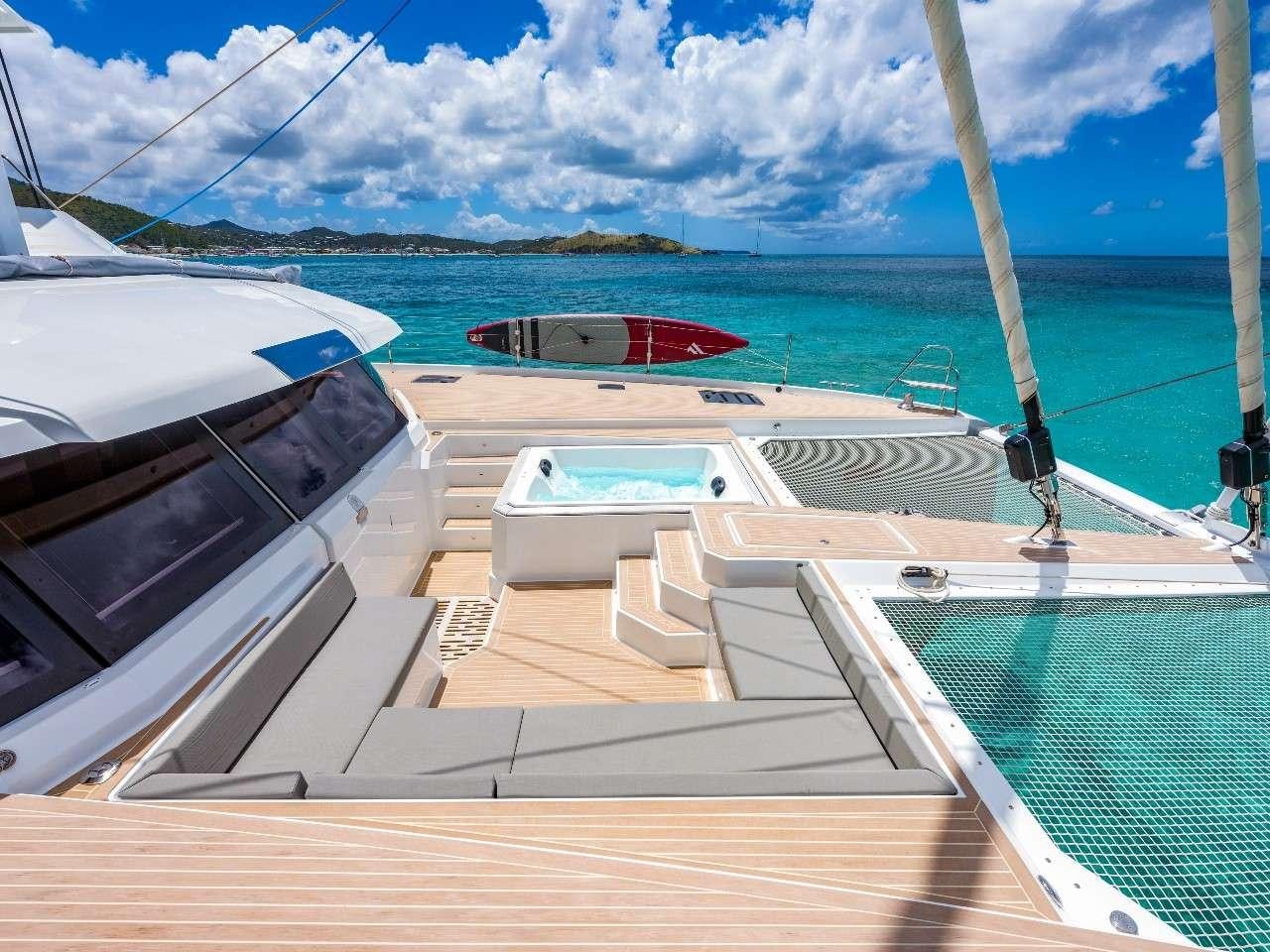 a row of boats on a beach aboard ADEONA Yacht for Charter