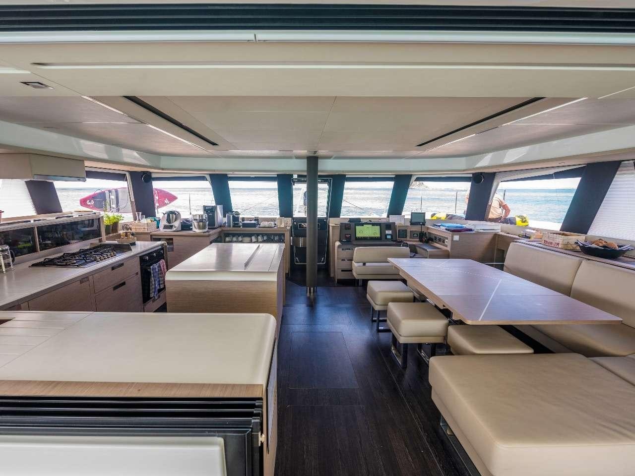 inside of a building with several beds aboard ADEONA Yacht for Charter