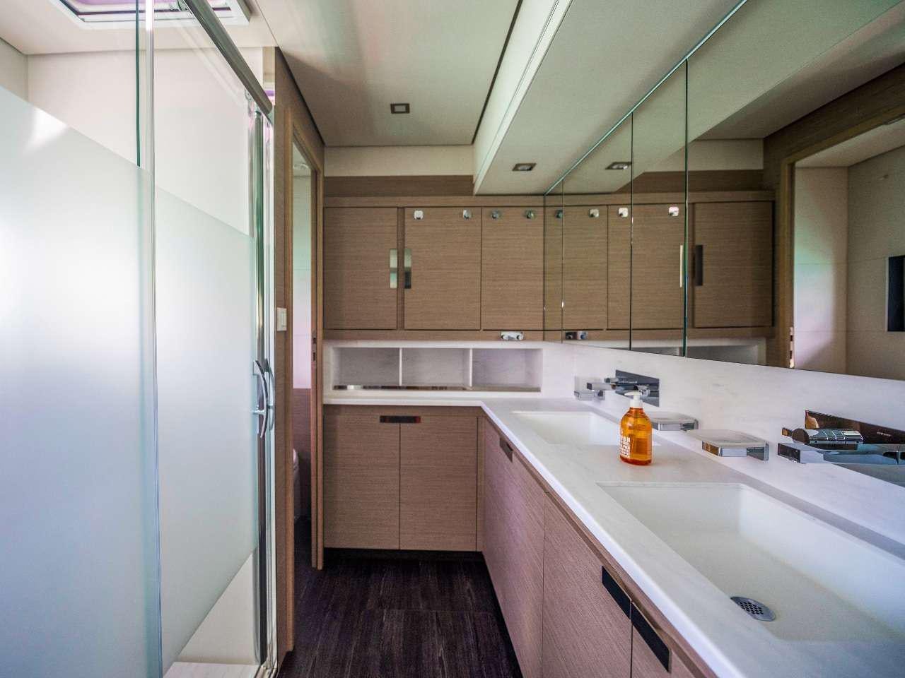a kitchen with a sink and cabinets aboard ADEONA Yacht for Charter