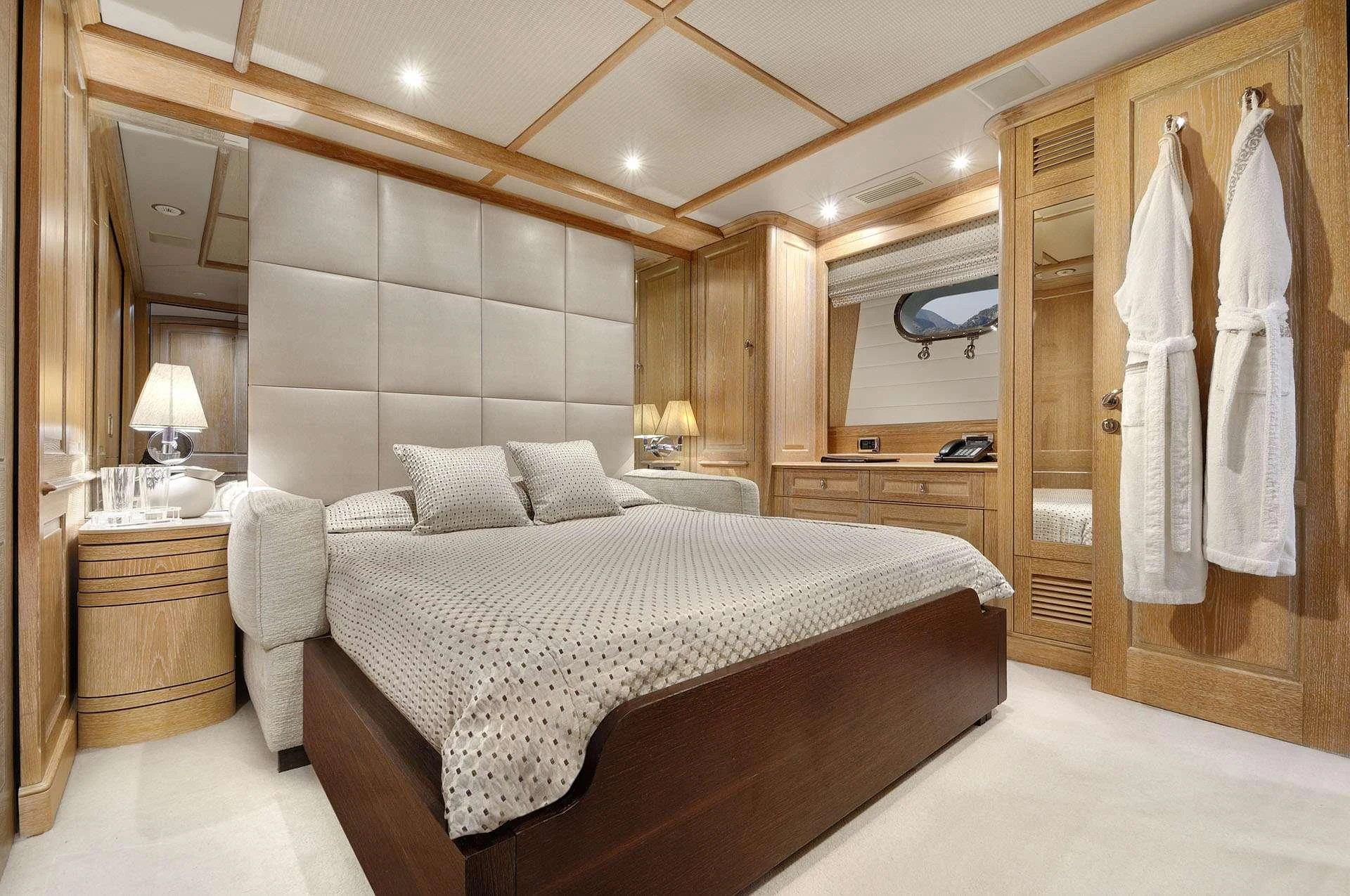 a large bedroom with a large bed aboard QUEST R Yacht for Charter