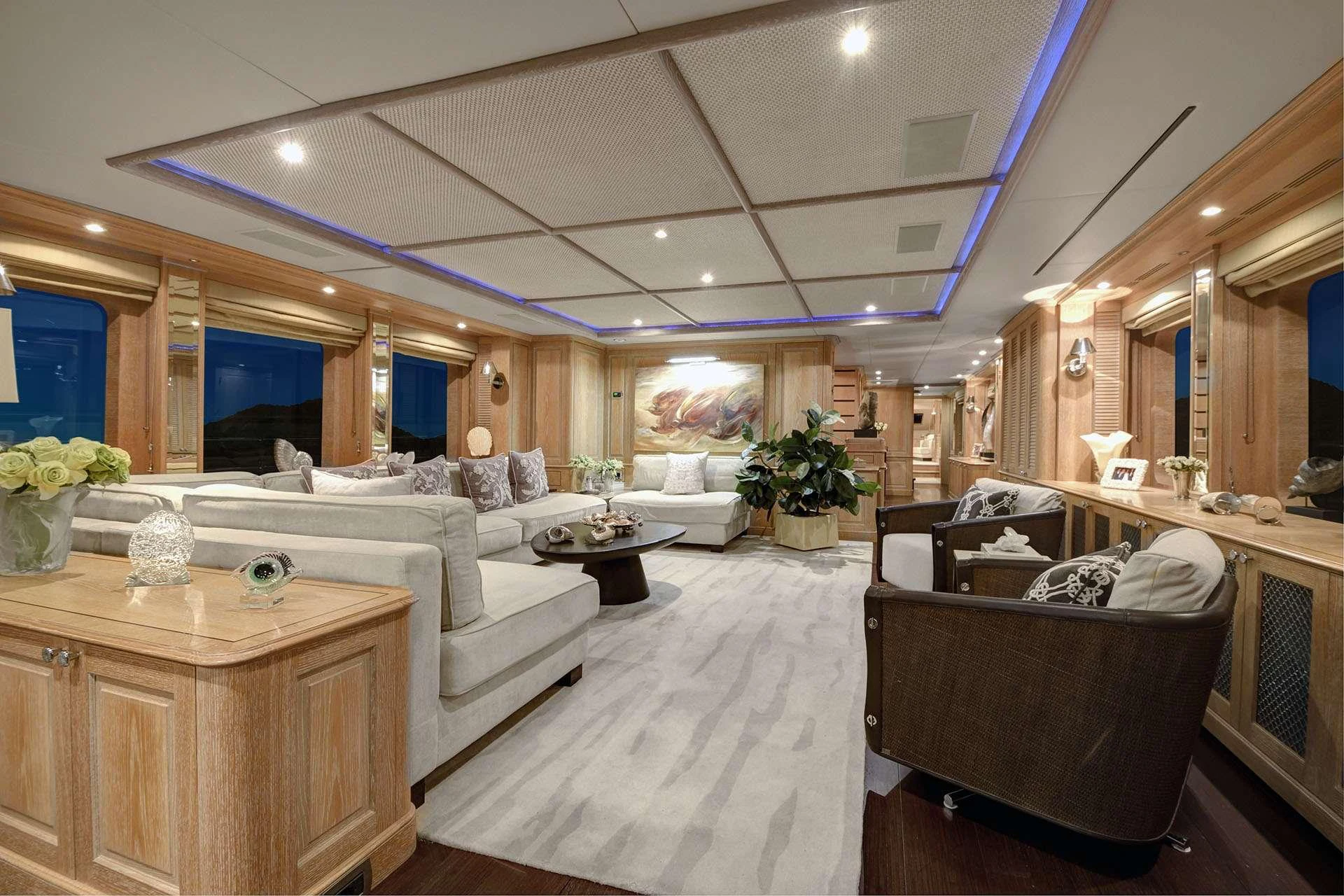 a living room with a large window aboard QUEST R Yacht for Charter