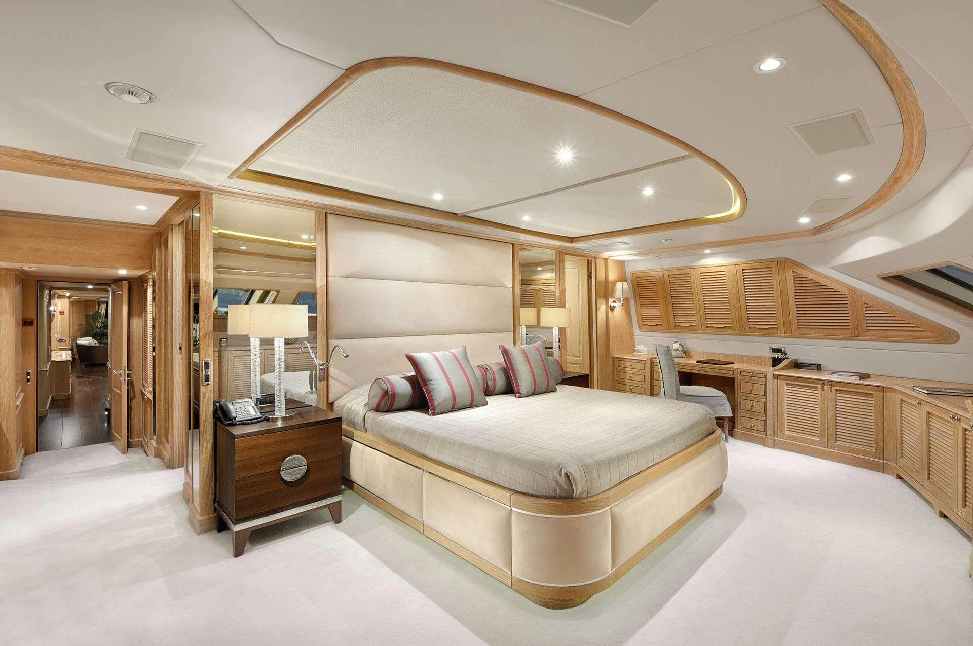 a large bedroom with a large bed aboard QUEST R Yacht for Charter