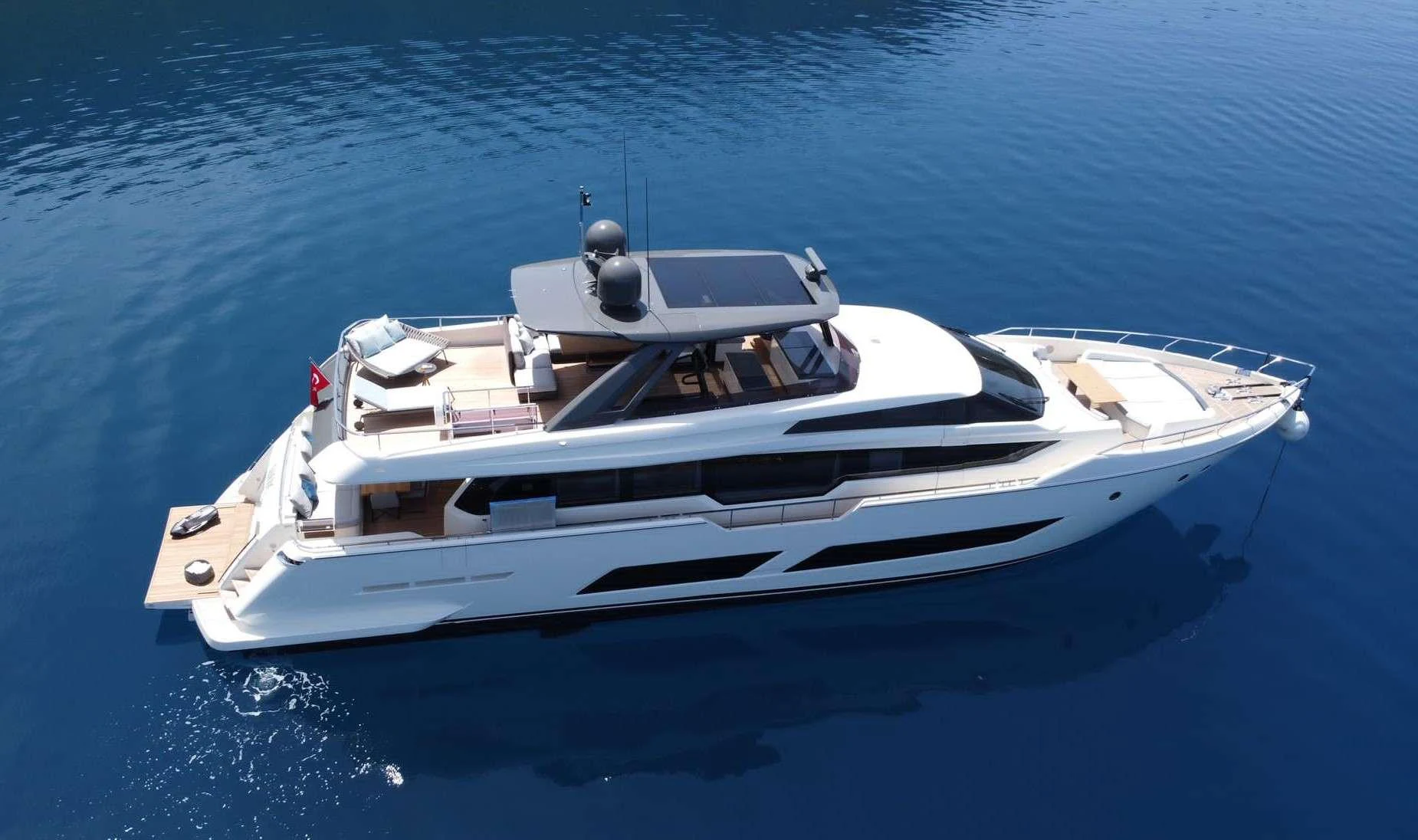 a white boat in the water aboard SHERO Yacht for Charter