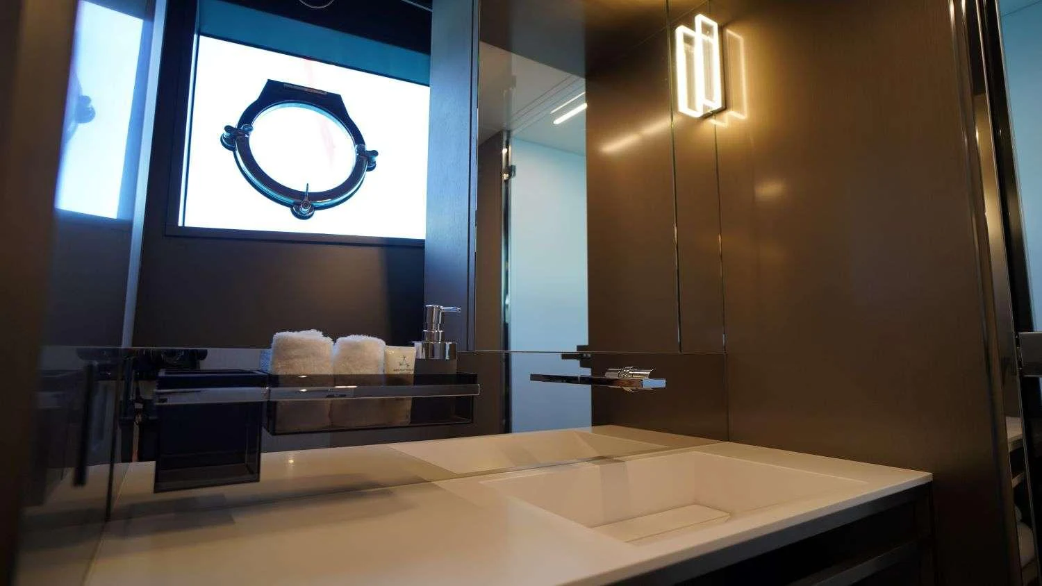 a large bathroom with a large window aboard SHERO Yacht for Charter