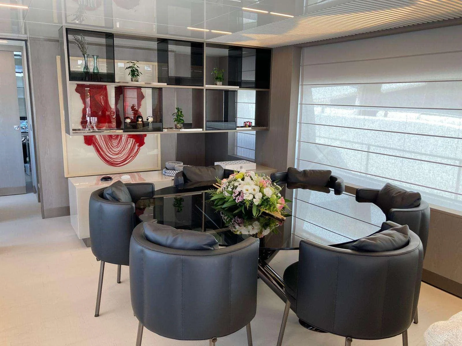 a room with a couch and chairs aboard SHERO Yacht for Charter