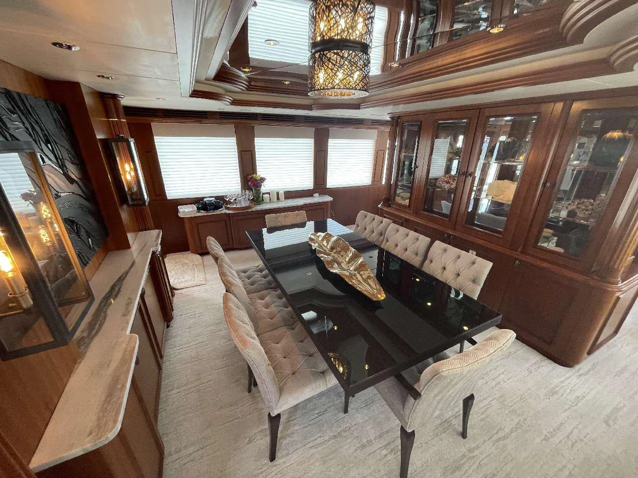 a living room with a leather couch aboard MAGNUM RIDE Yacht for Charter